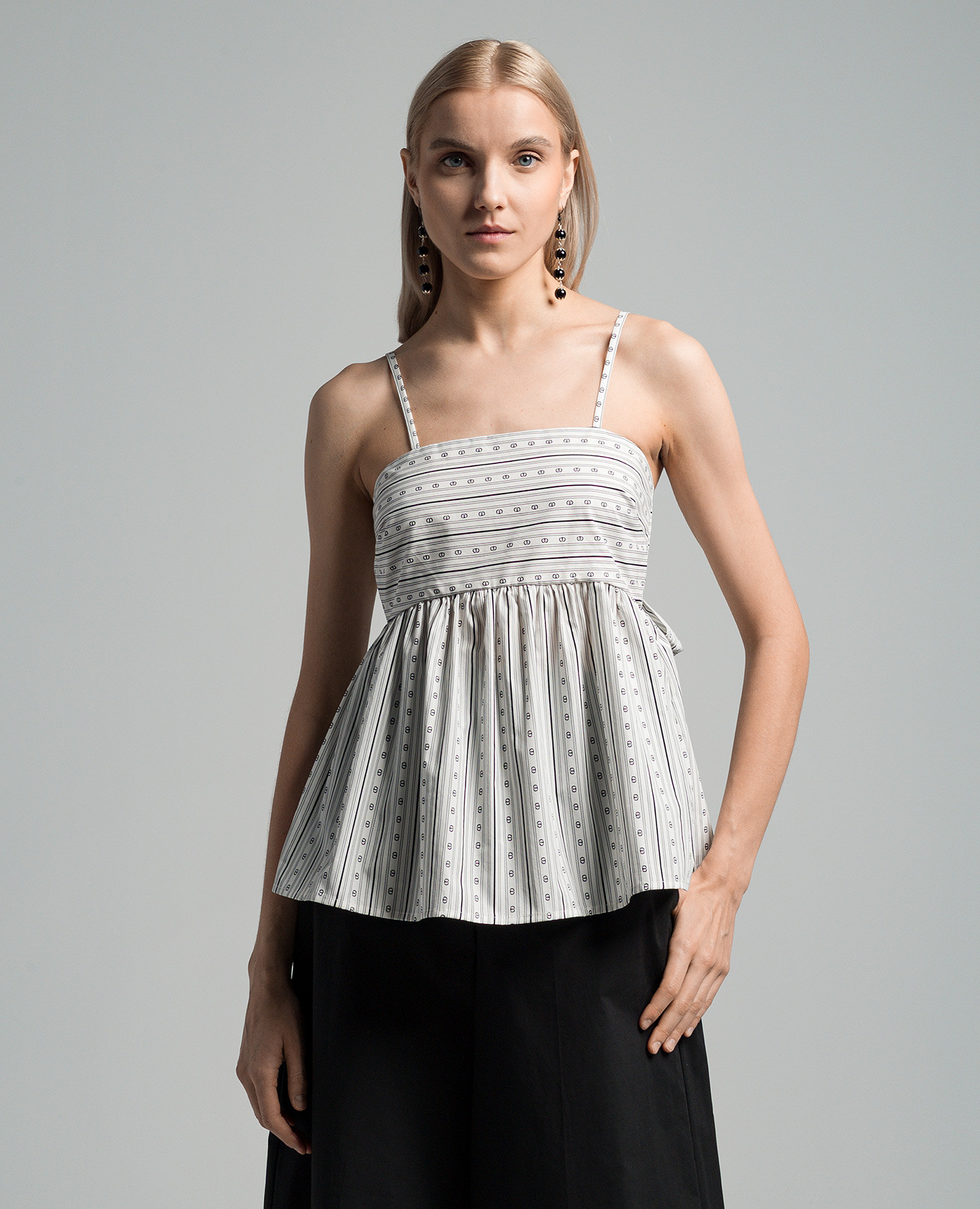 White top in a branded pattern Twinset
White top in a branded pattern Twinset