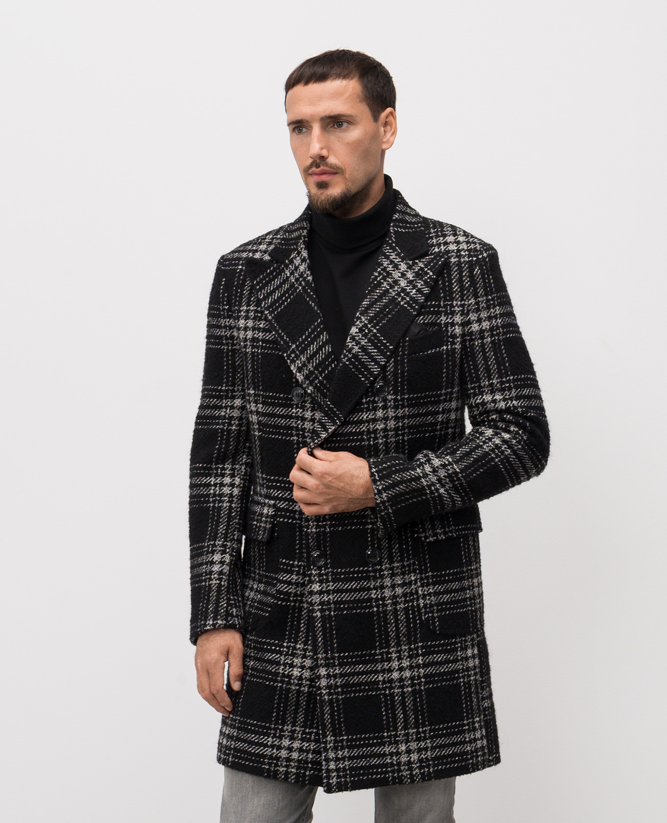 Black double-breasted coat with checked wool Exibit
Black double-breasted coat with checked wool Exibit