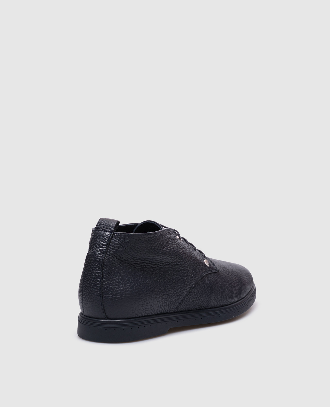Blue leather desert boots with fur trim and metal eagle head emblem Stefano Ricci
Blue leather desert boots with fur trim and metal eagle head emblem Stefano Ricci