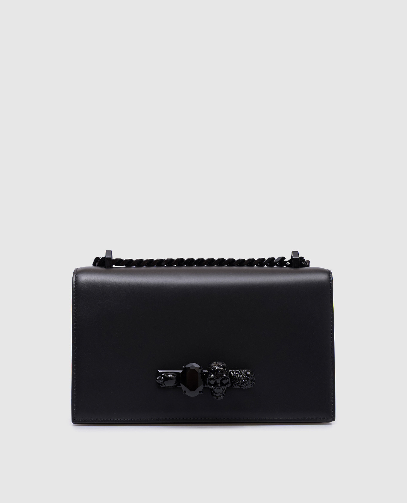 Jeweled black leather crossbody bag with branded crystal studded clutch Alexander McQueen
Jeweled black leather crossbody bag with branded crystal studded clutch Alexander McQueen