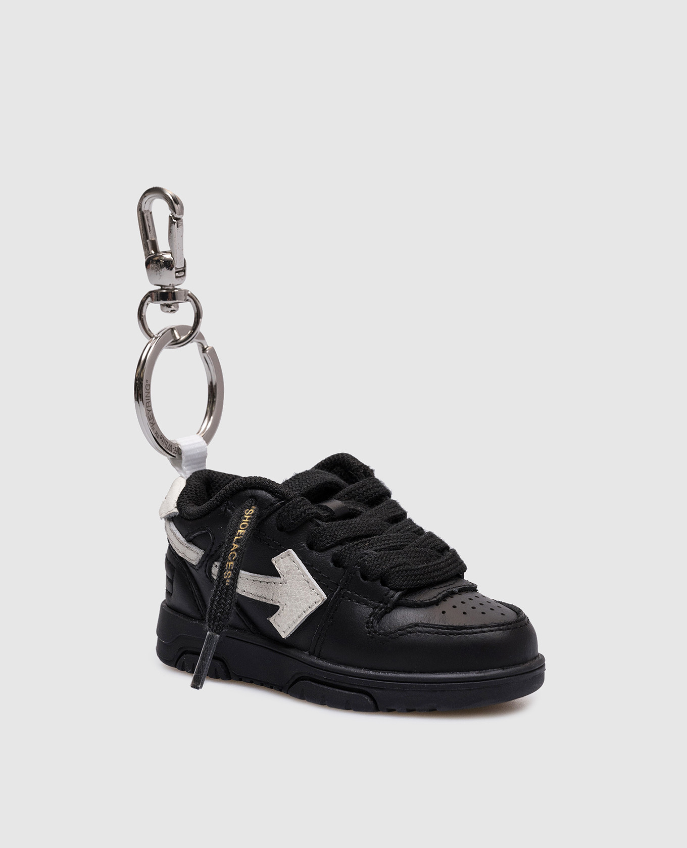 Black keychain-pendant in the form of a branded Out of office sneaker Off-White
Black keychain-pendant in the form of a branded Out of office sneaker Off-White