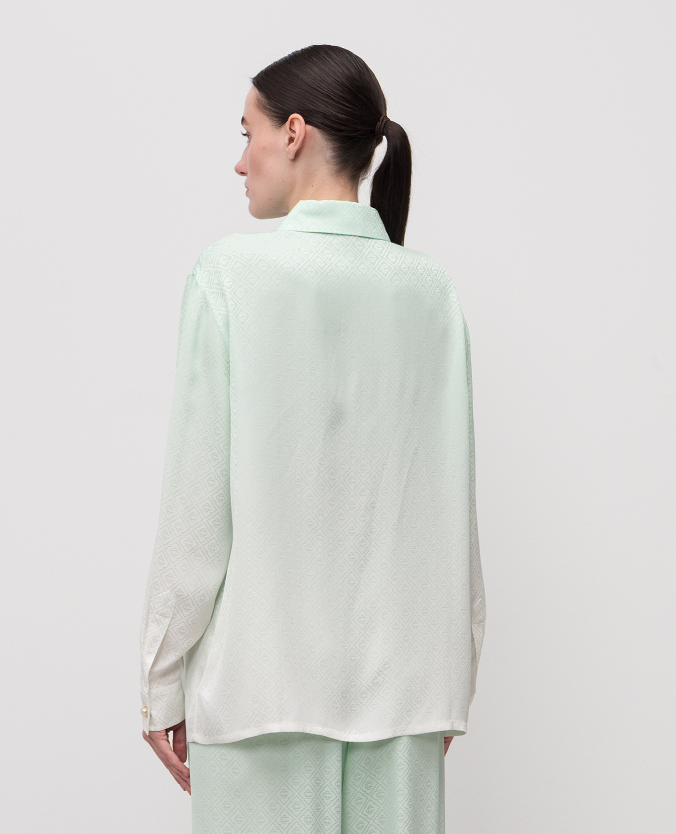 Green blouse with emblem pattern Casablanca
Green blouse with emblem pattern Casablanca