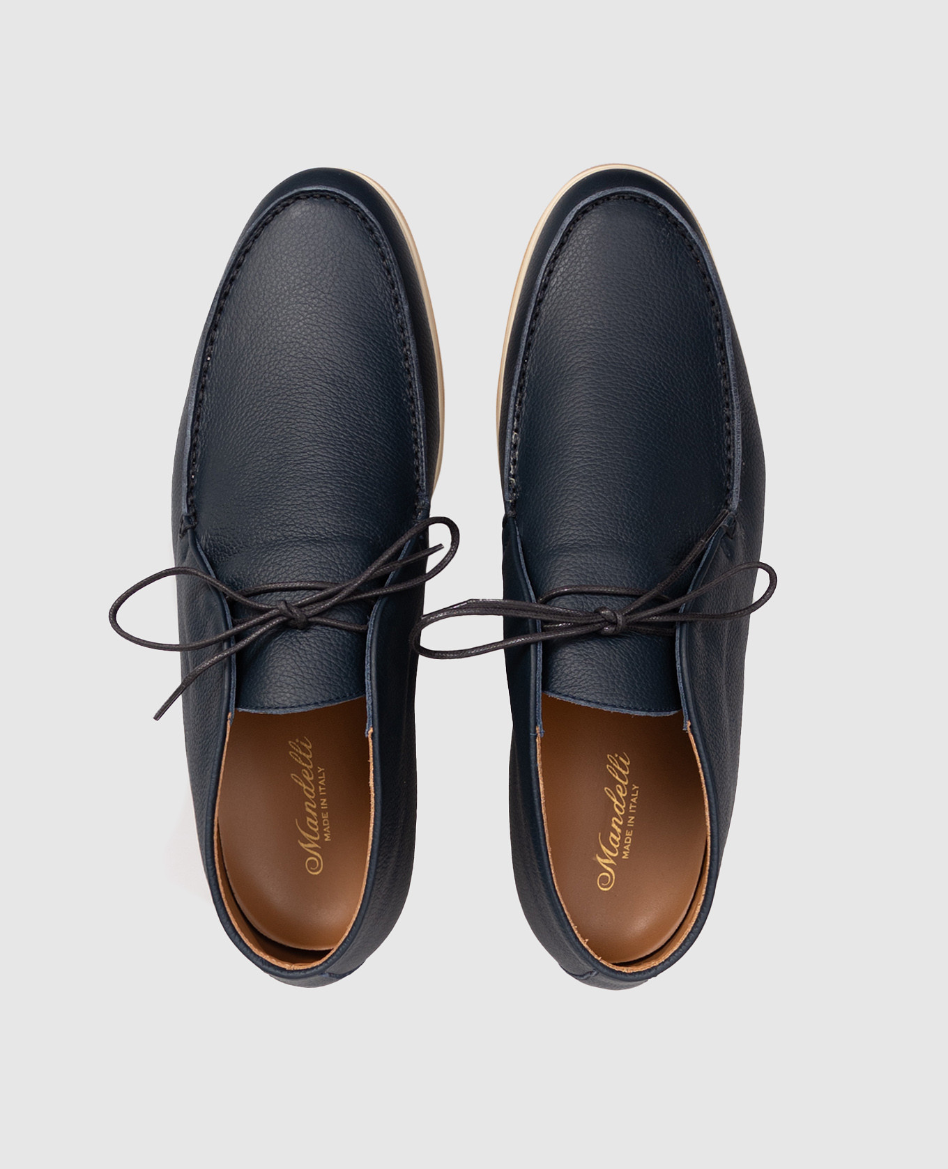 Blue leather deserts Enrico Mandelli
Blue leather deserts Enrico Mandelli