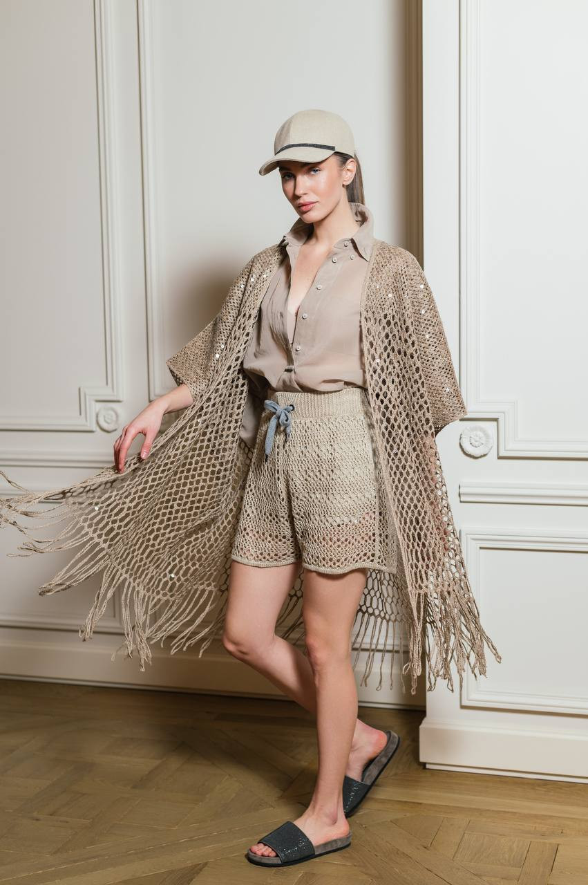 Beige openwork cardigan made of silk and linen with sequins Brunello Cucinelli
Beige openwork cardigan made of silk and linen with sequins Brunello Cucinelli