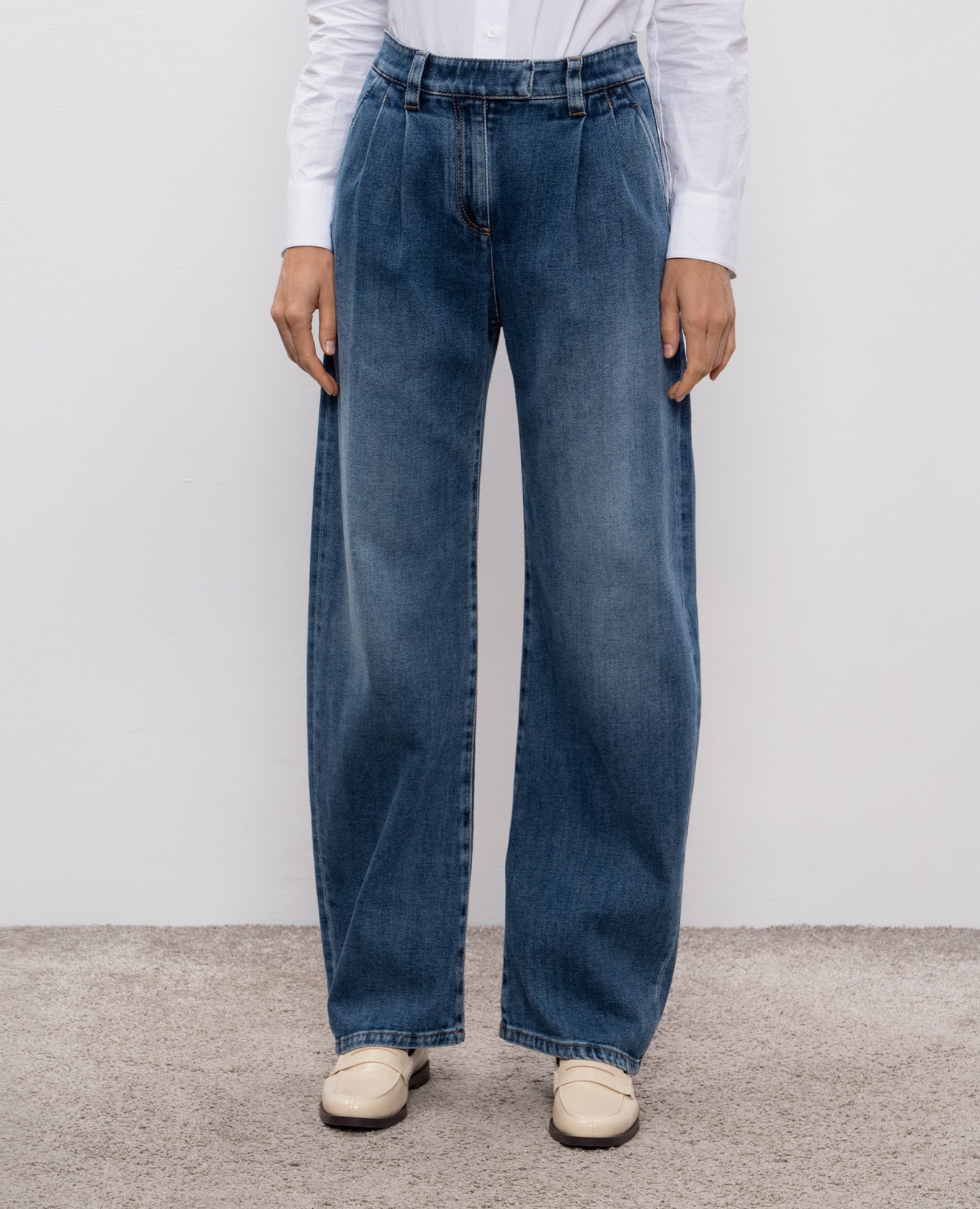 

Blue jeans with a worn effect Brunello Cucinelli