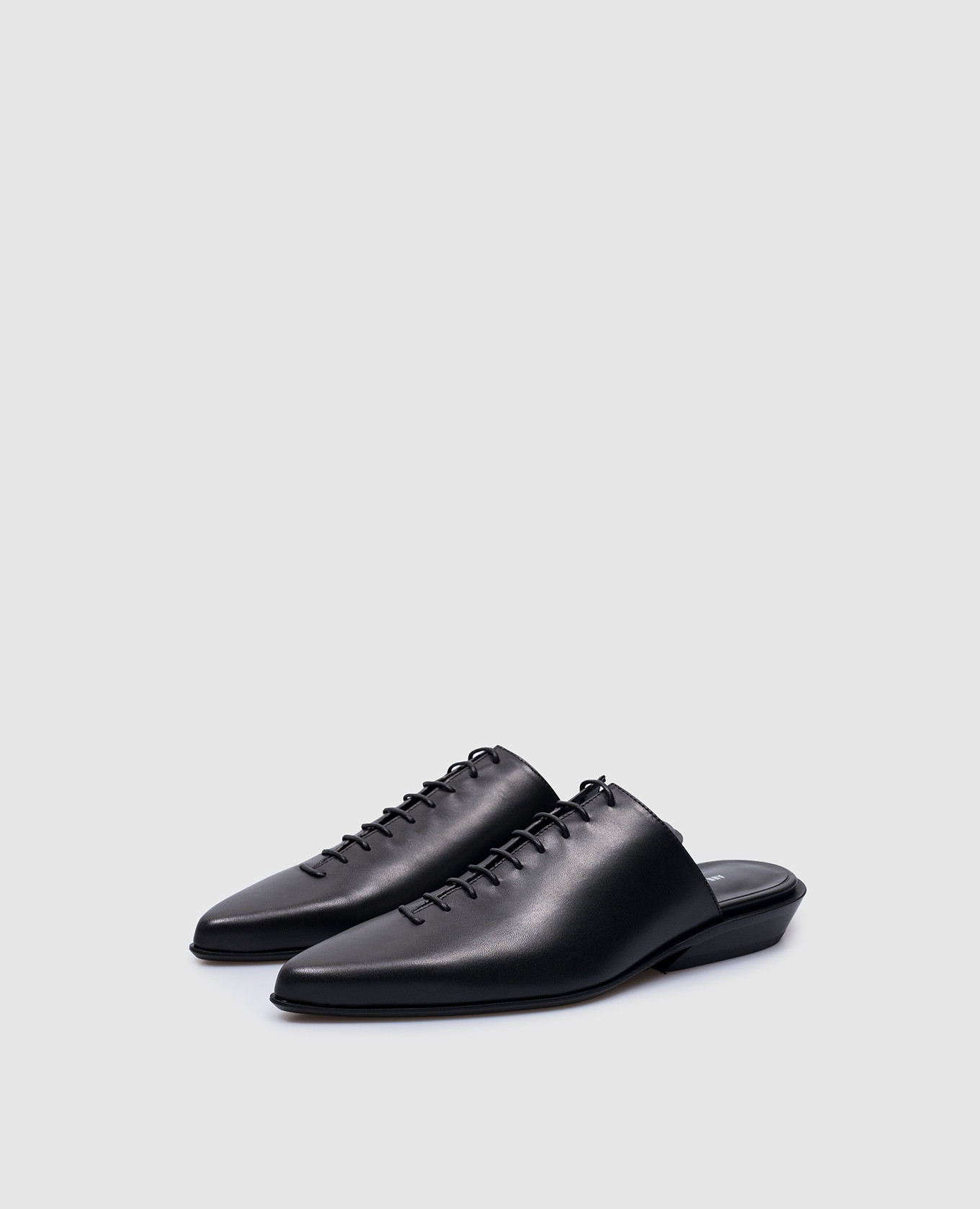 

River Lages black leather mules Ann Demeulemeester