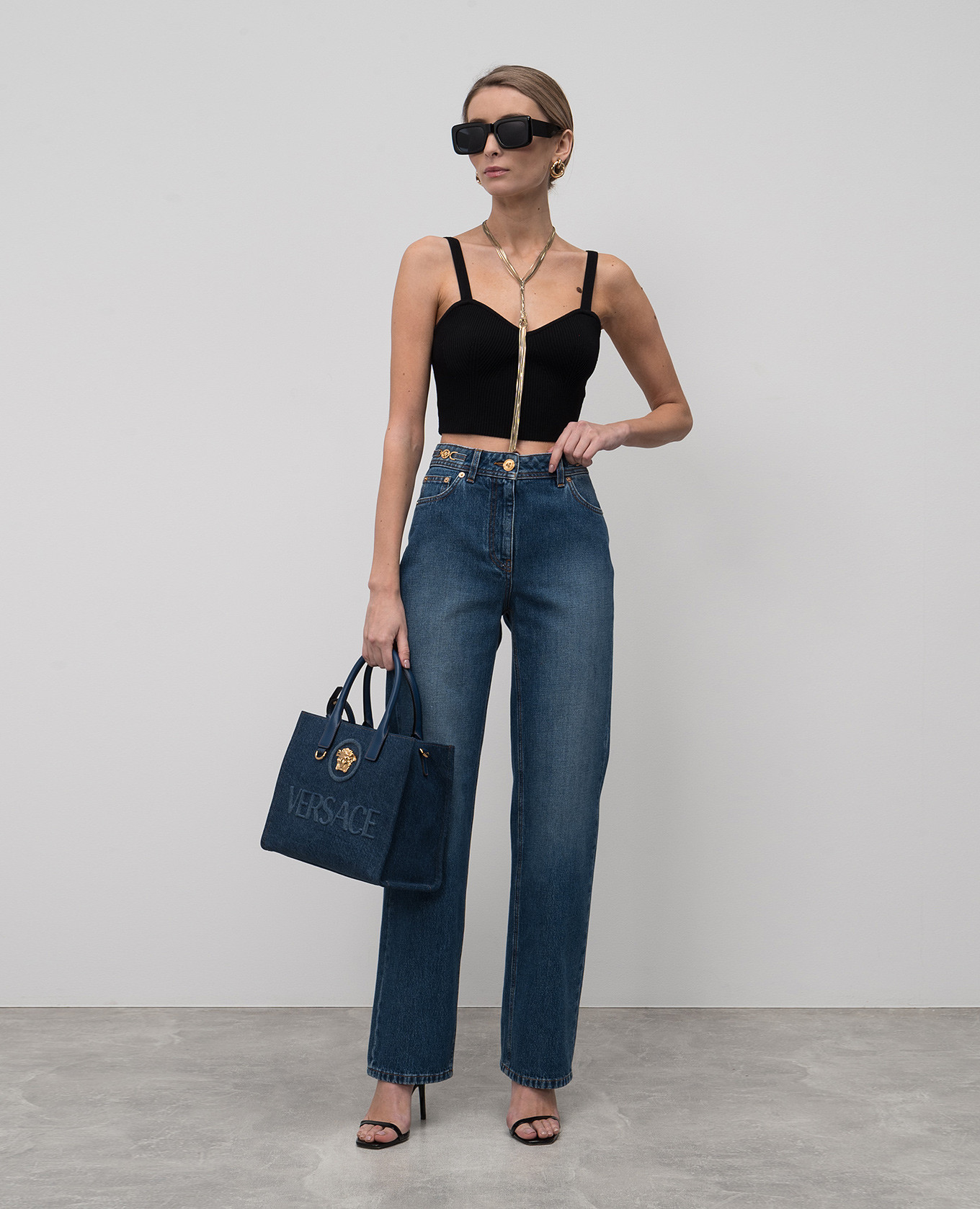 

Blue jeans with a worn effect Versace