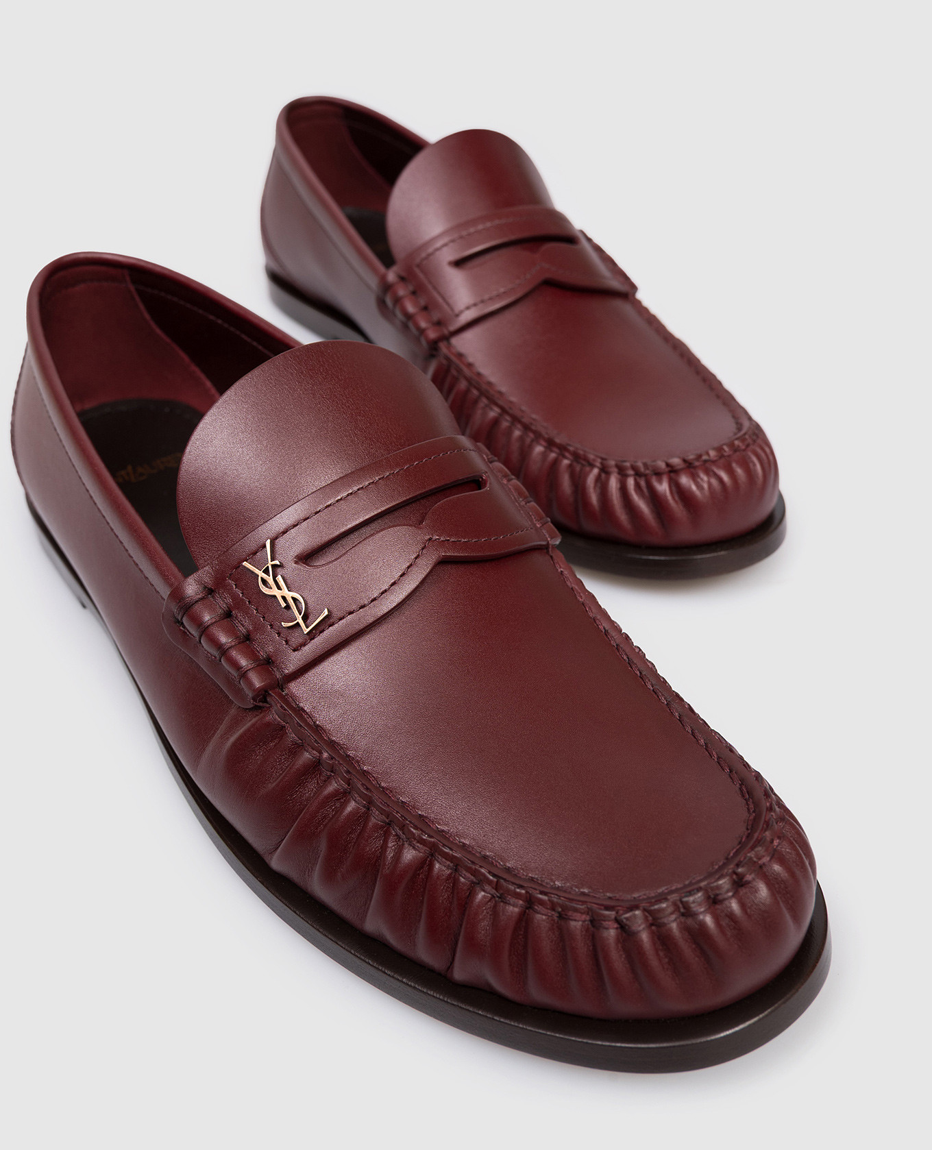 

Burgundy leather loafers with logo Saint Laurent