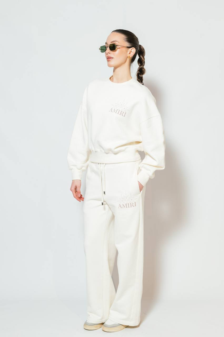 

Beige sweatpants with logo print AMIRI