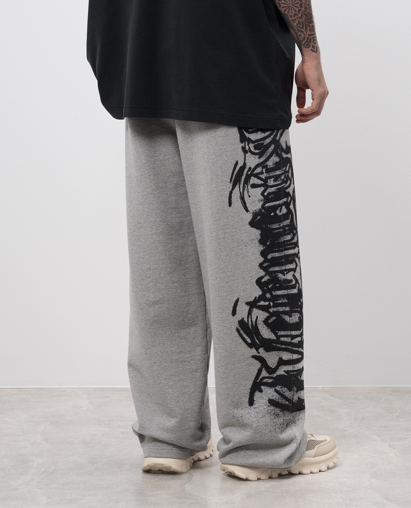 

Gray melange sweatpants with logo print Vetements, Grey