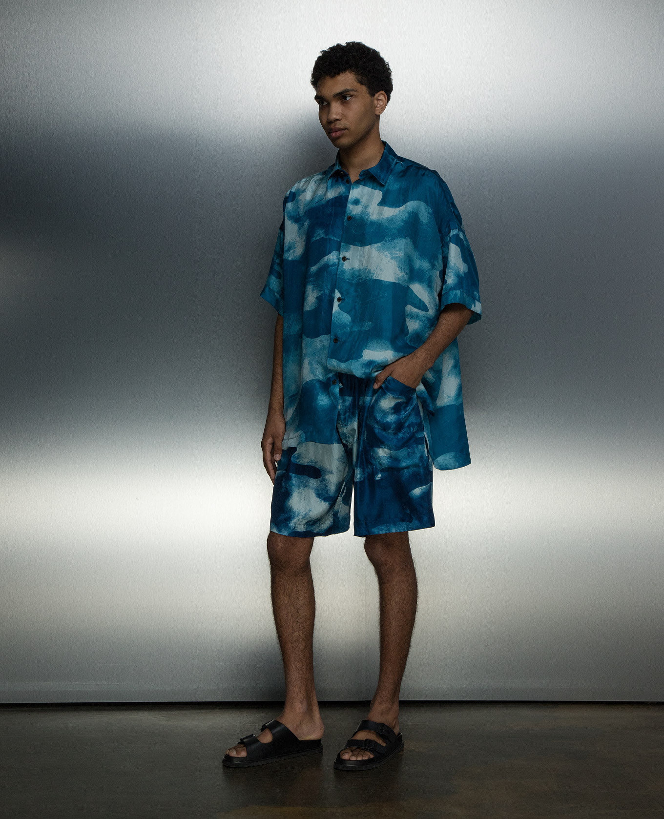 

Blue shorts made of silk in an abstract pattern Jan Jan Van Essche