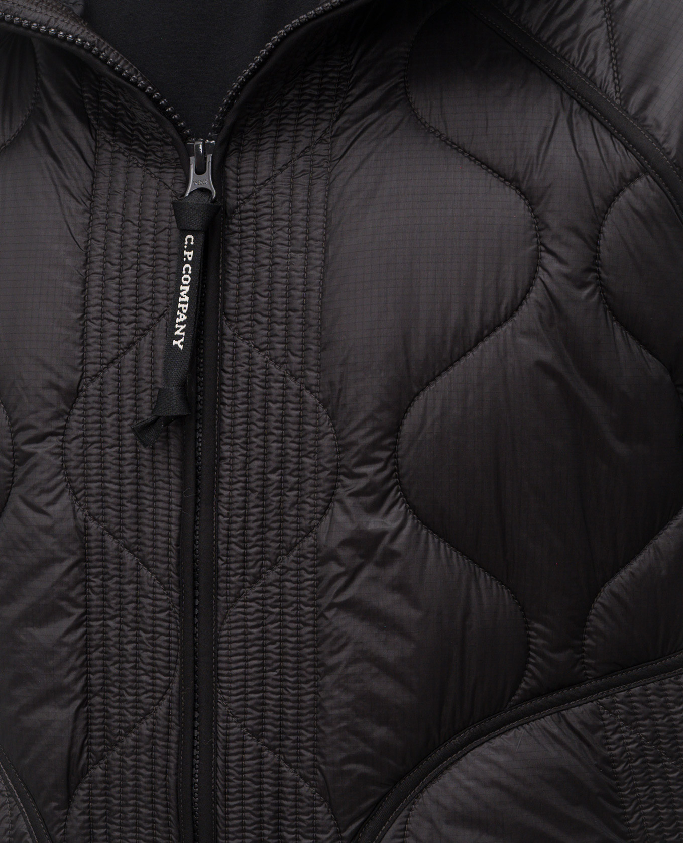 

Black quilted jacket with logo C.P. Company