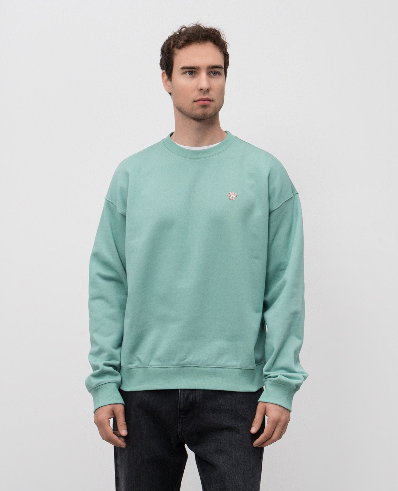 

Green sweatshirt with logo patch Versace