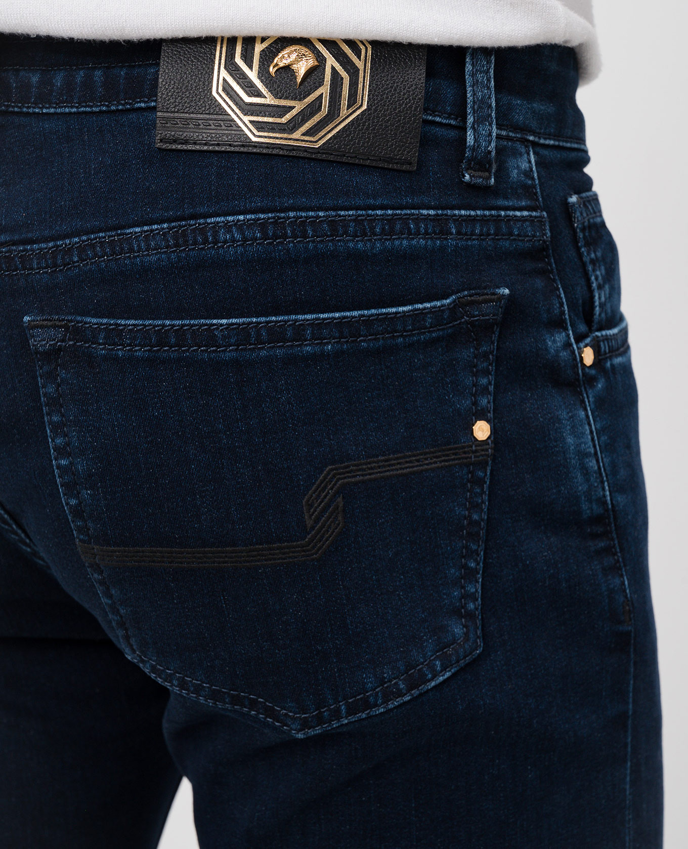 

Blue jeans with leather logo patch Stefano Ricci