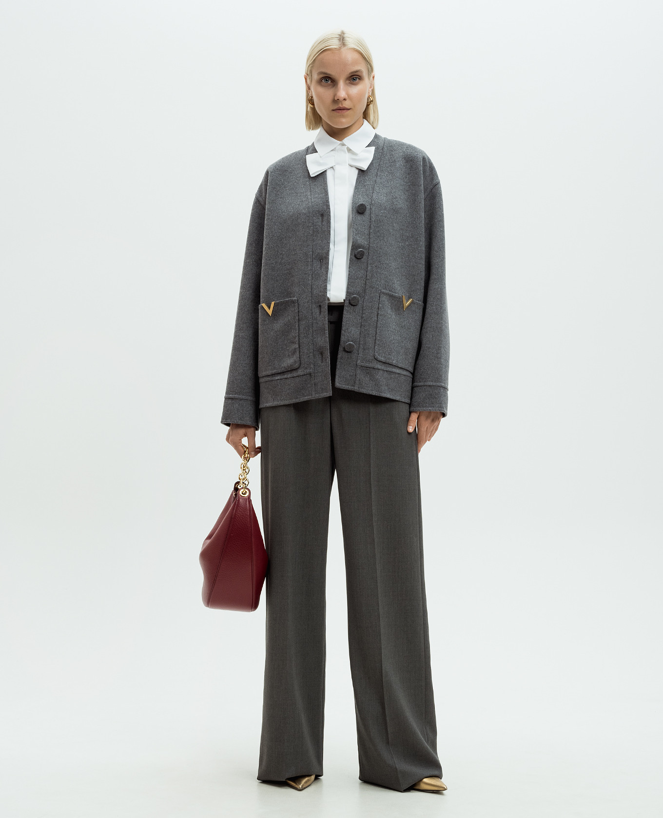 

White shirt with appliqué in the form of a bow Valentino