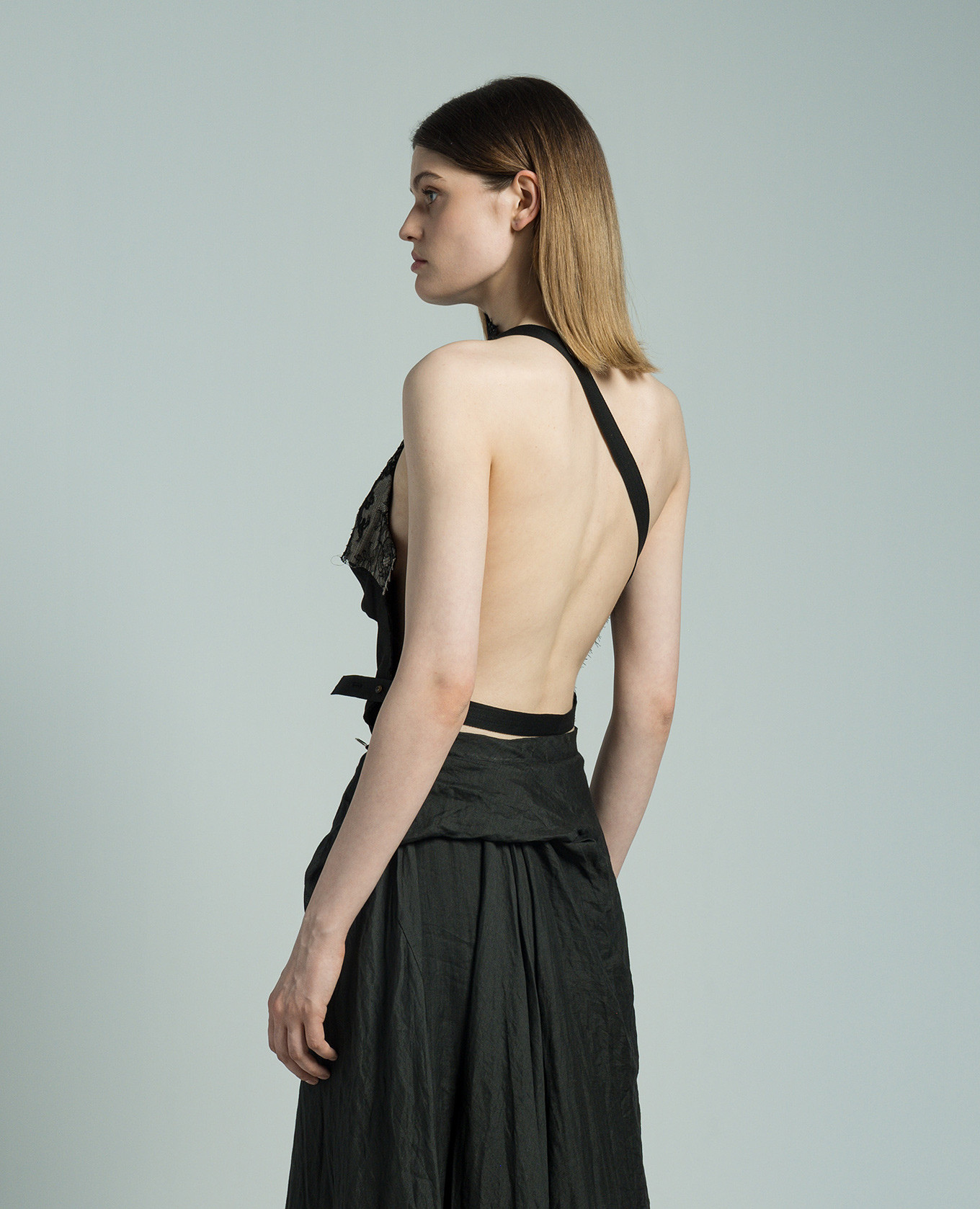 

Black wool lace top with open back Marc Le Bihan