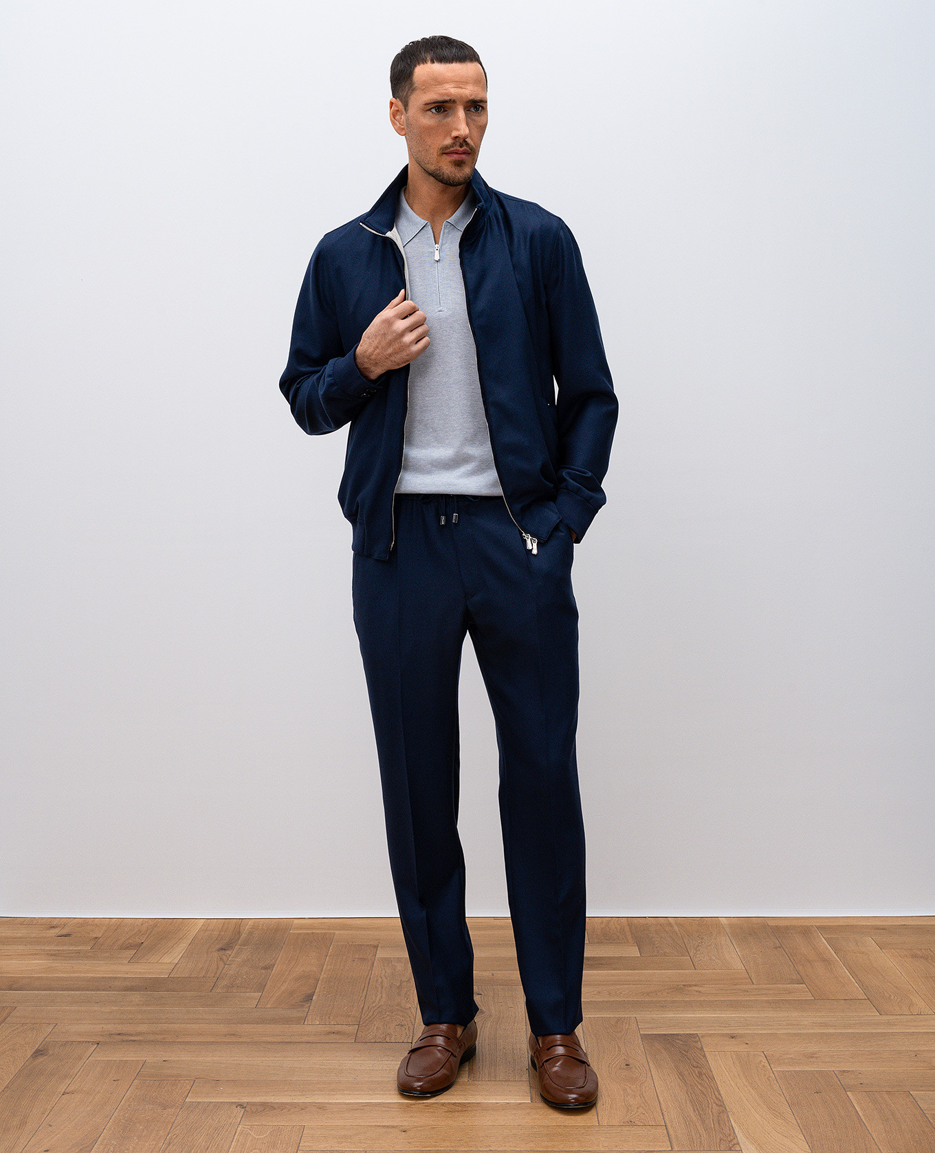 

Grey silk polo shirt with logo Enrico Mandelli