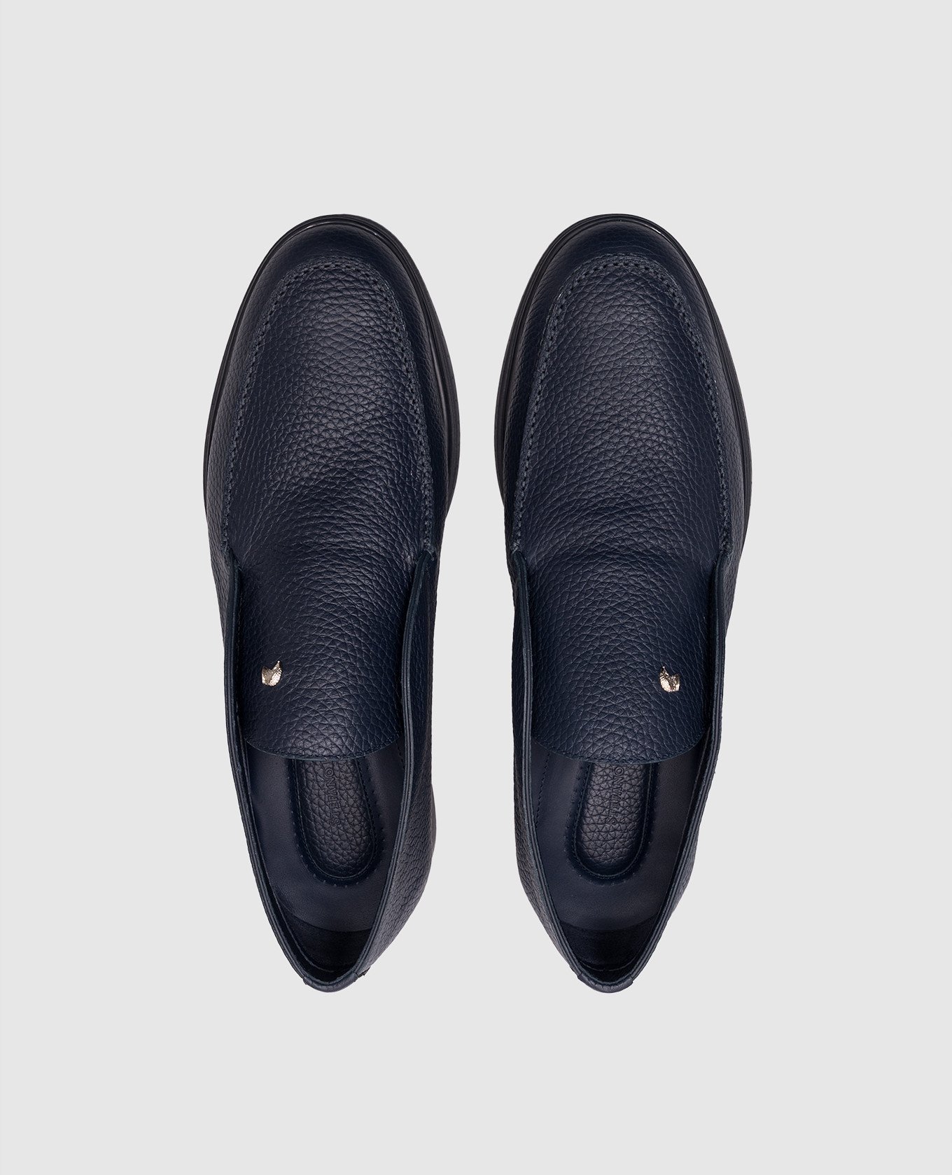

Blue leather deserts with emblem Stefano Ricci