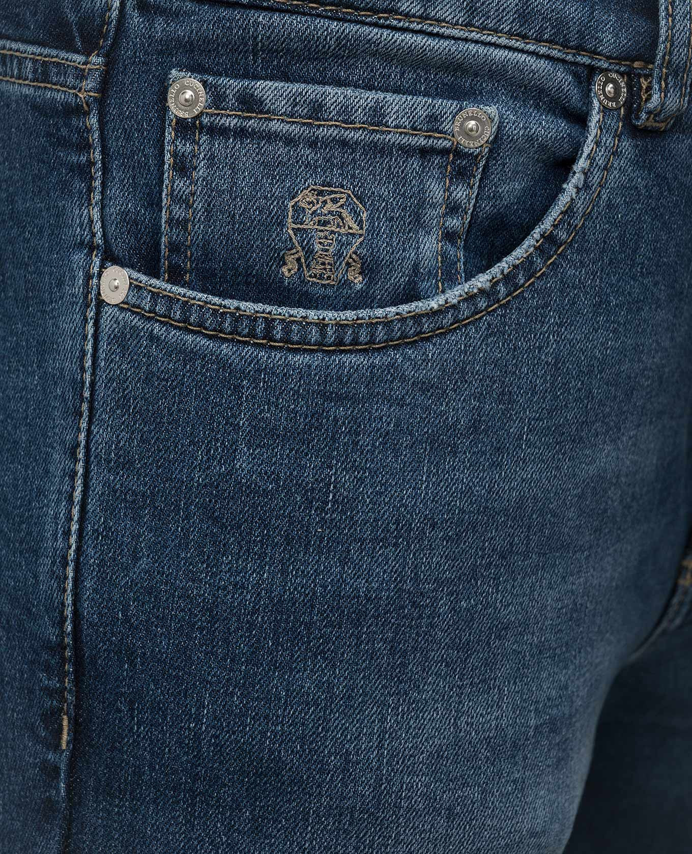 

Blue jeans with a distressed effect Brunello Cucinelli
