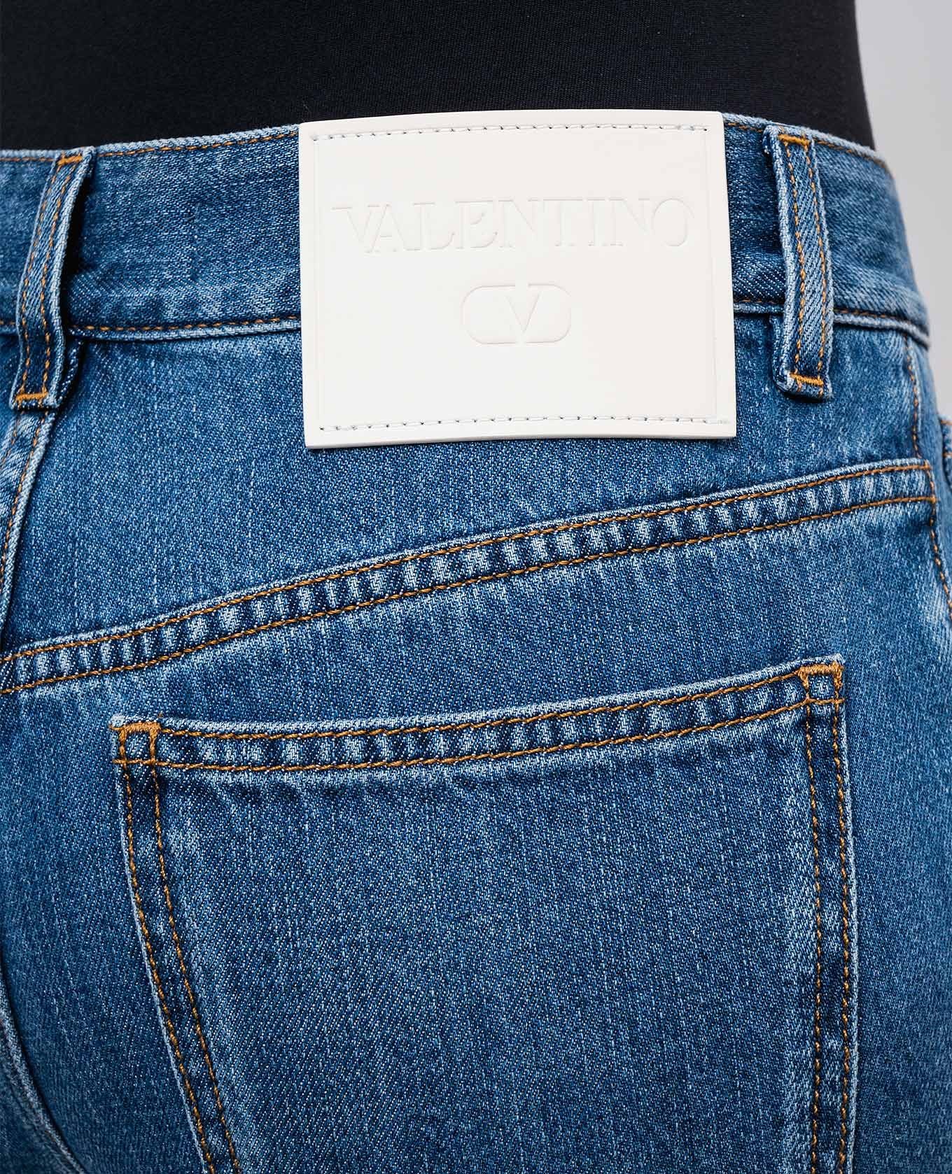 

Blue jeans with logo patch Valentino