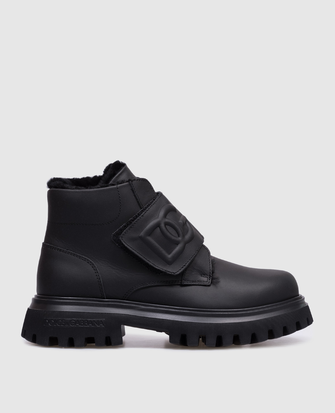 

Children's black leather boots on fur with a textured logo Dolce&Gabbana