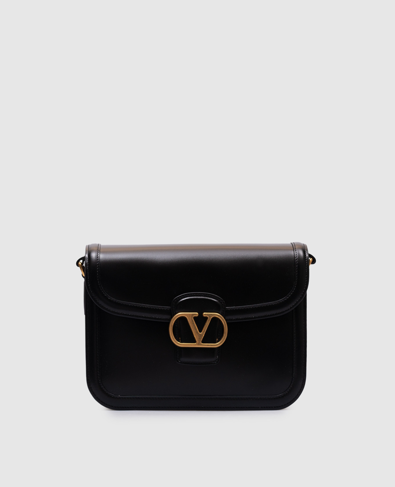 

Black leather messenger bag with logo Valentino