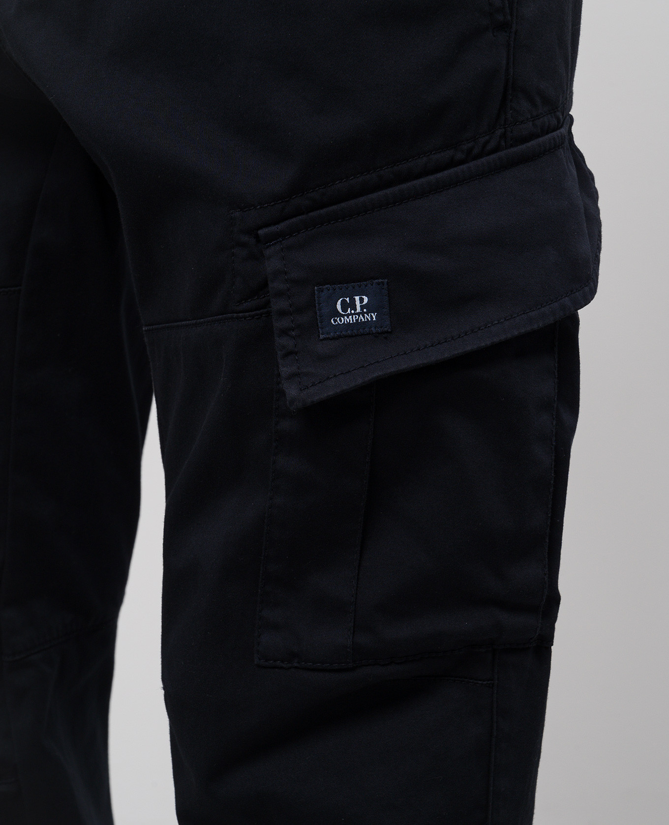 

Blue cargo pants with logo patch C.P. Company