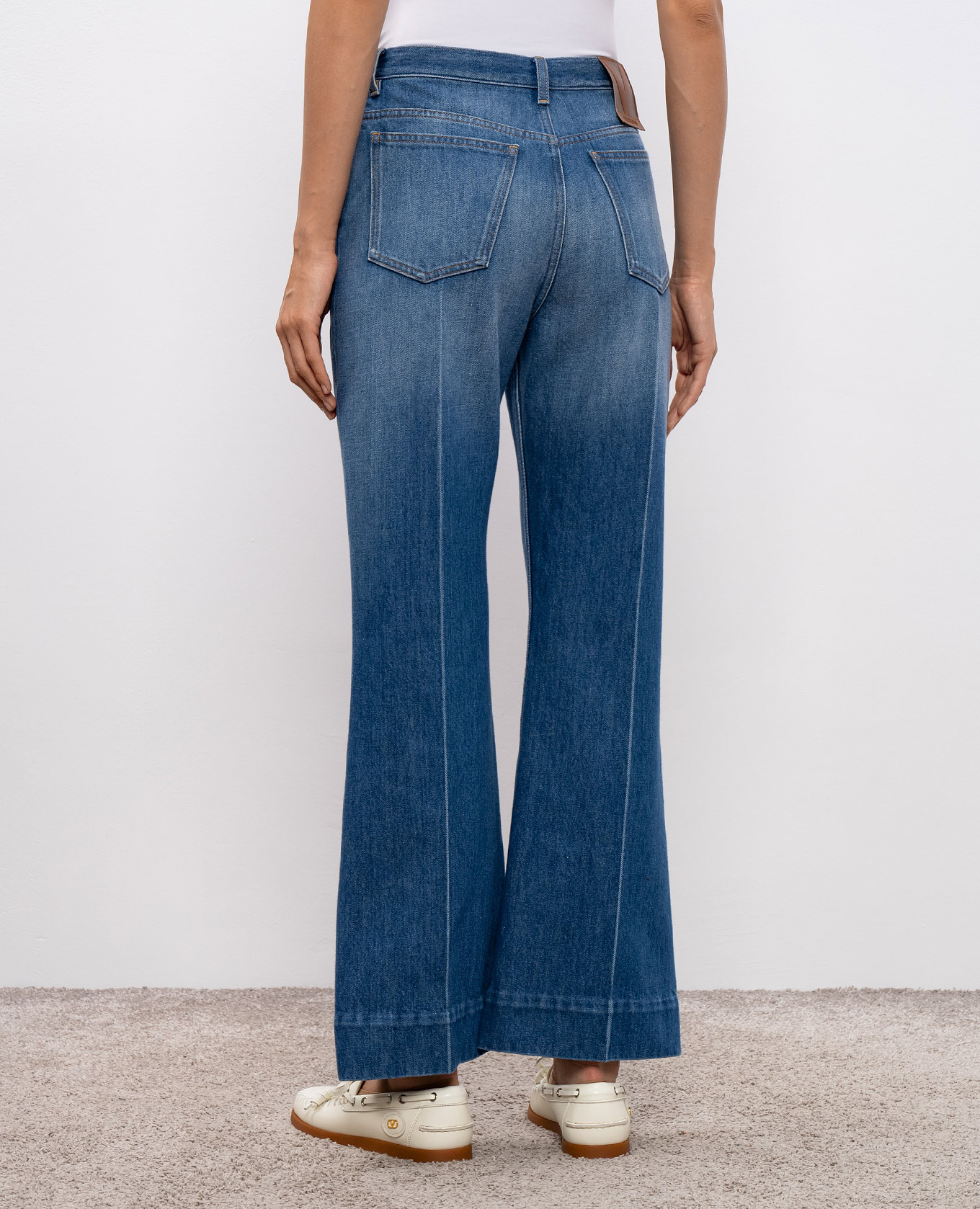 

Blue flared jeans with a worn effect Valentino