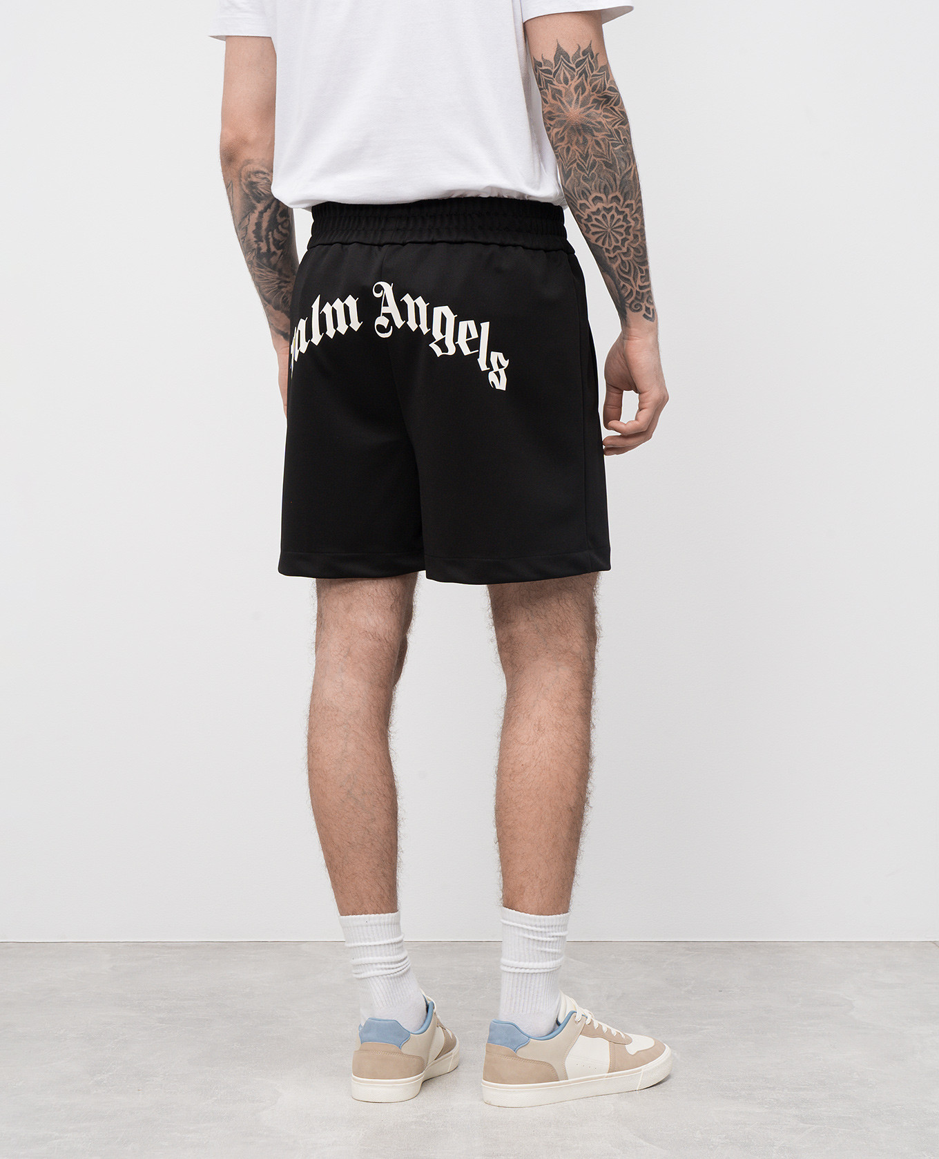 

Black shorts with logo print Palm Angels