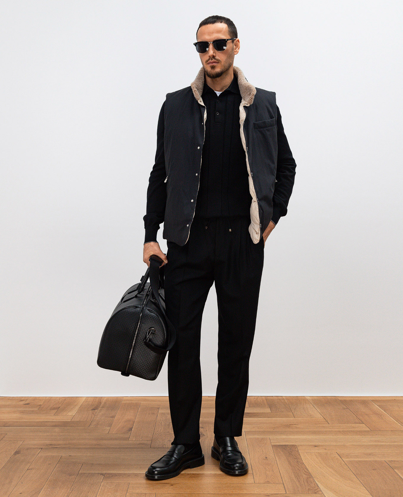 

Black polo in a woven pattern Brunello Cucinelli