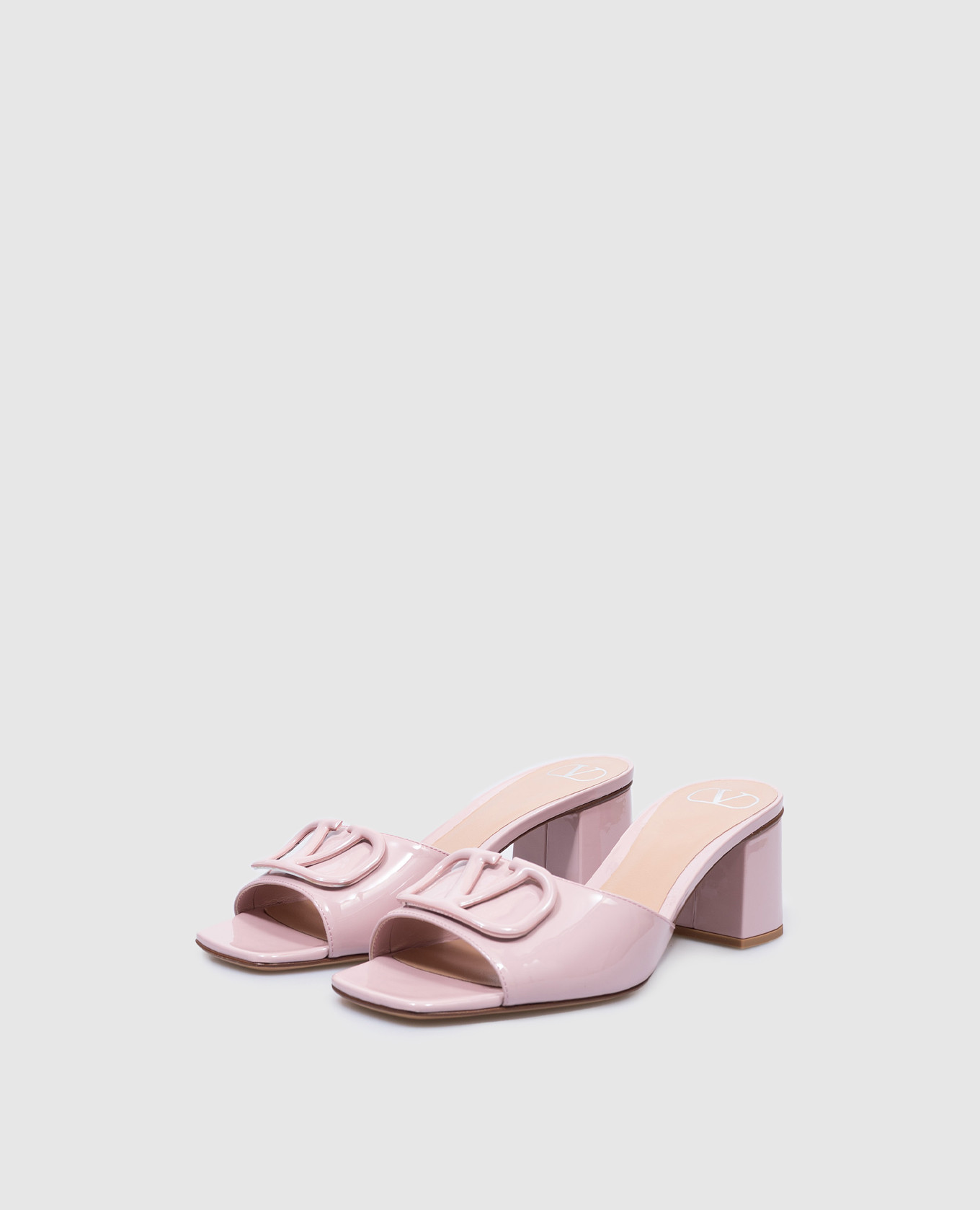

Pink patent leather mules with logo Valentino
