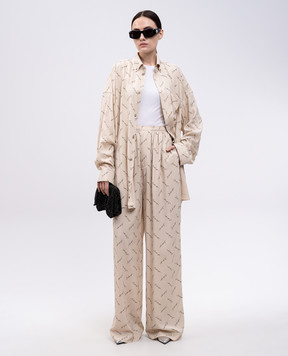 Balenciaga Beige pants with logo print 814016TRLB1