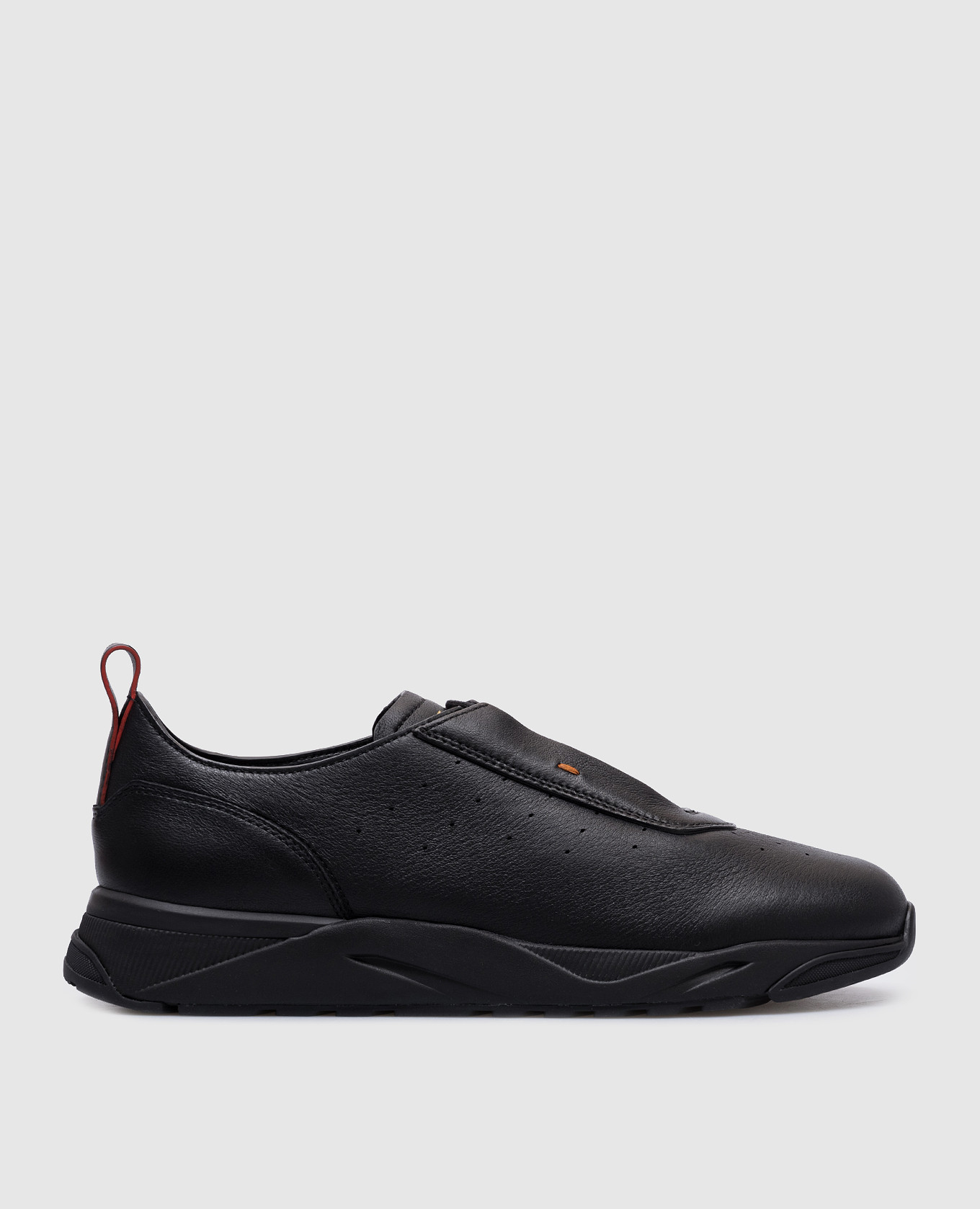 

Black sneakers on fur with a logo Santoni