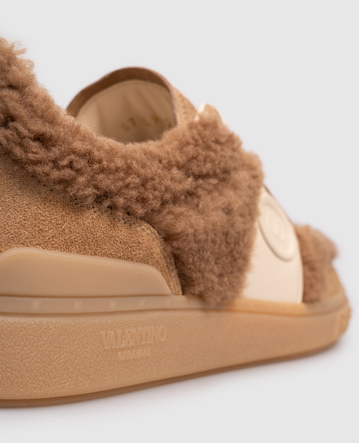 

Beige suede sneakers with fur Valentino