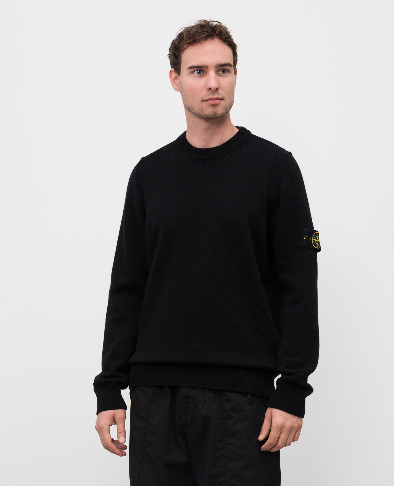 

Black wool sweater with logo Stone Island