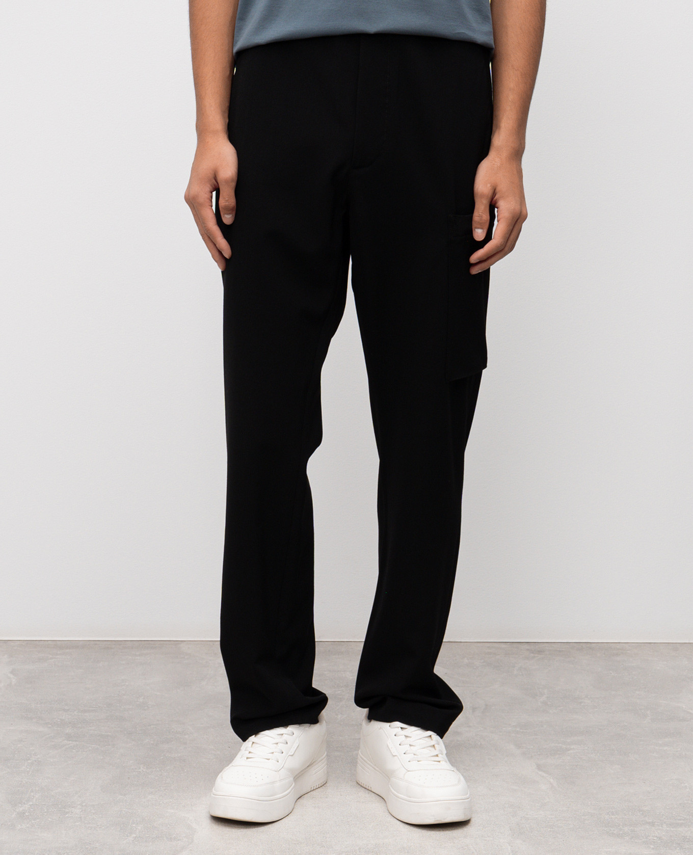 

Black wool trousers with logo patch C.P. Company