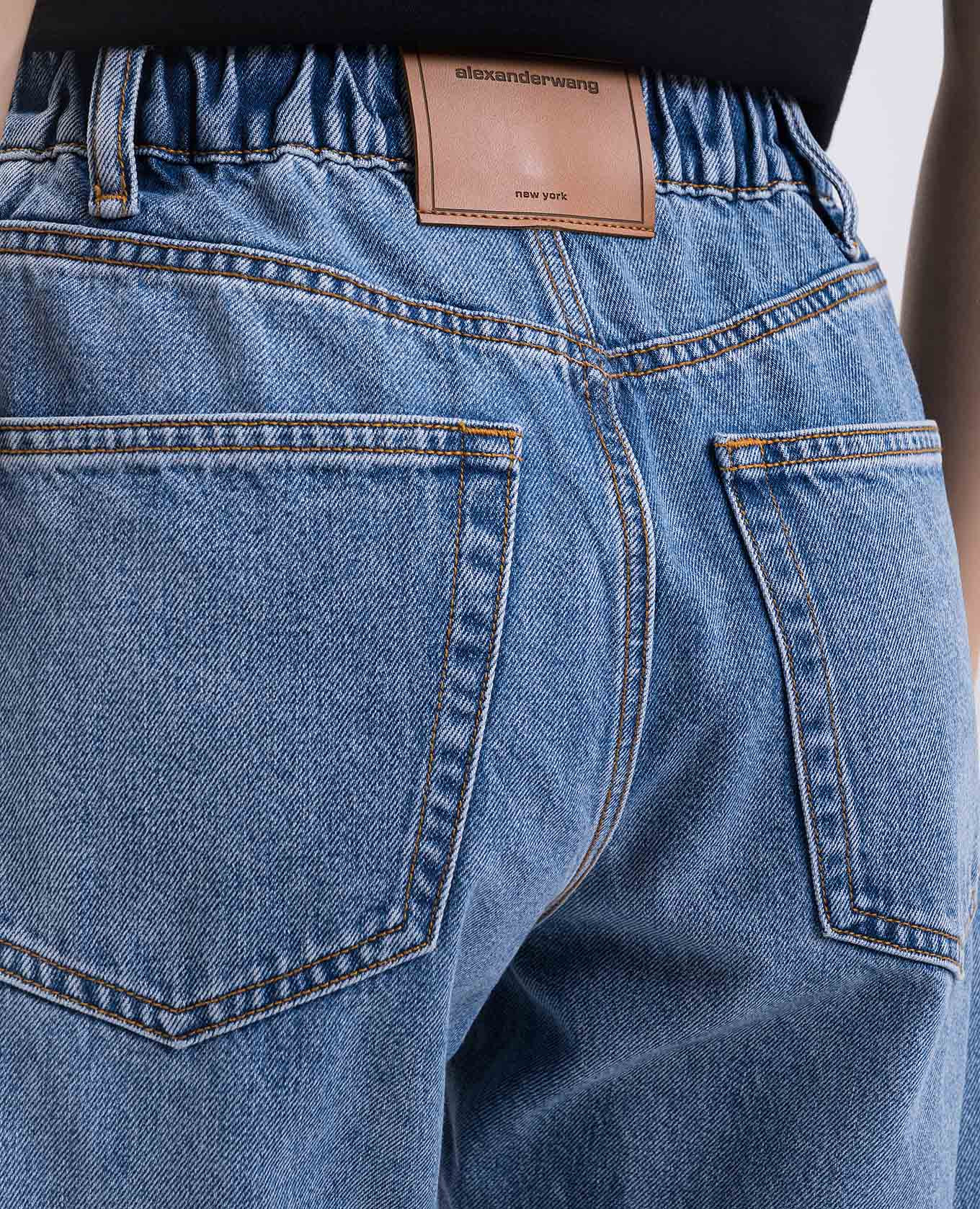 

Blue jeans with textured logo Alexander Wang
