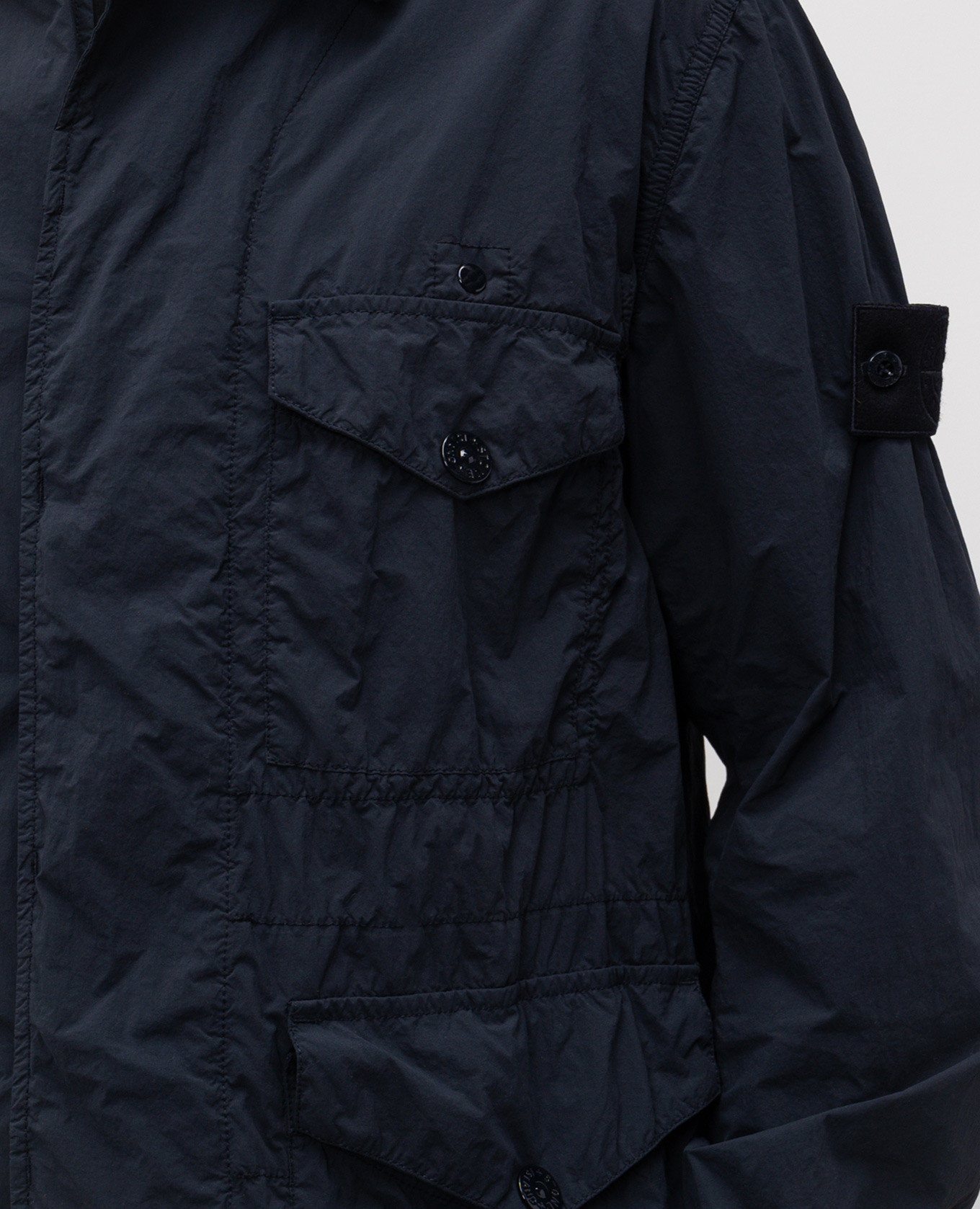 

Blue windbreaker with logo Stone Island