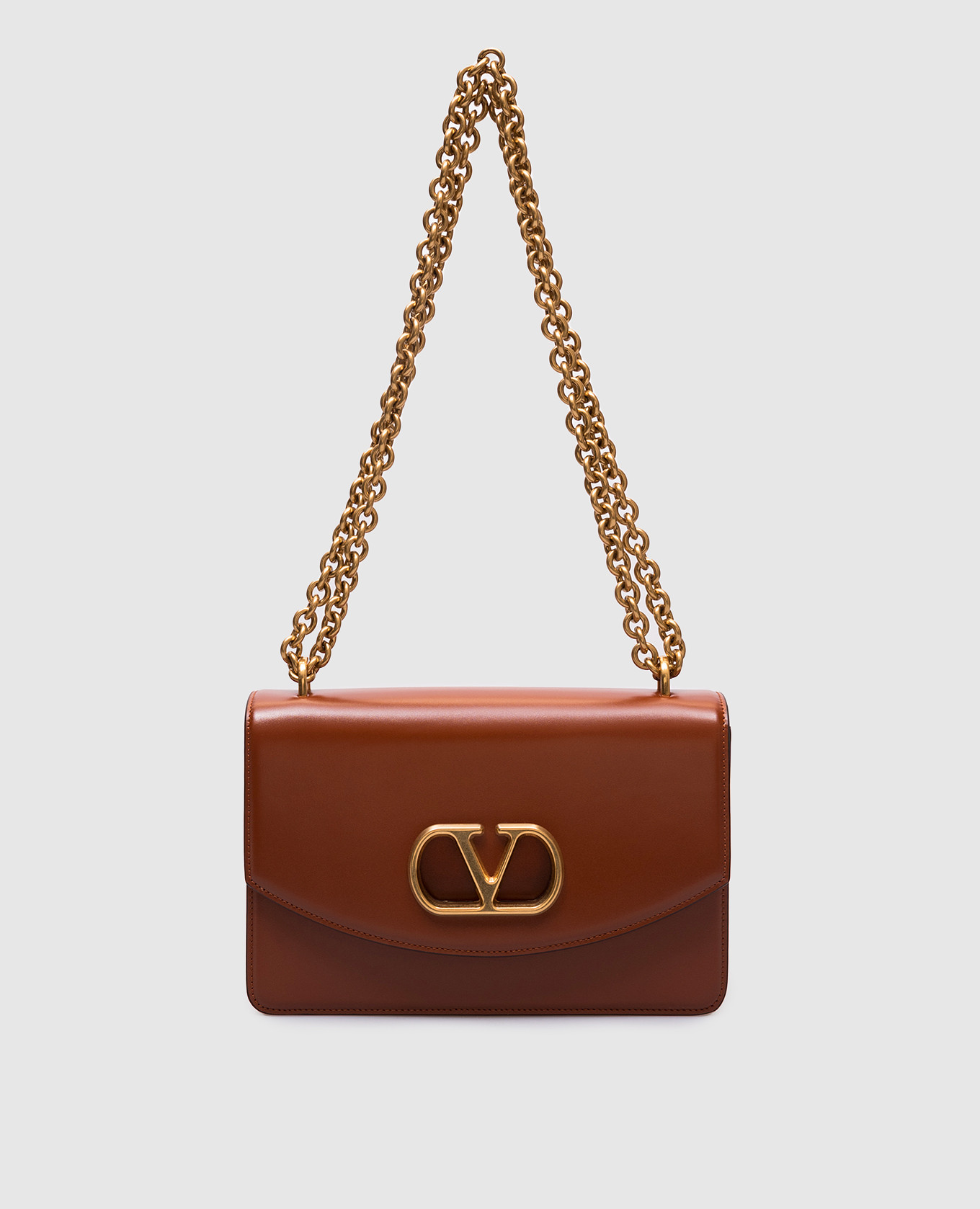

Brown leather messenger bag VAIN Valentino