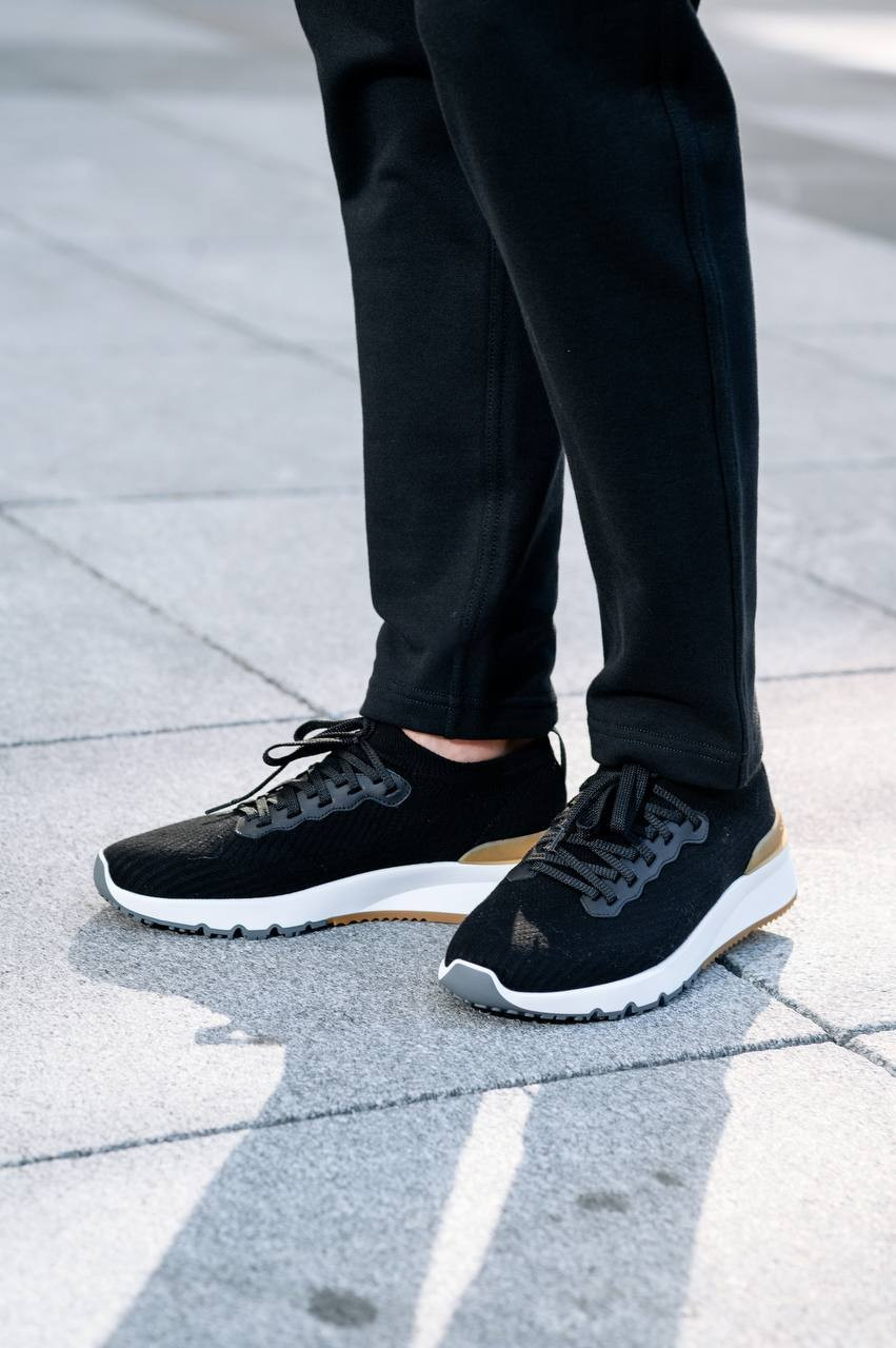 

Black sneakers with leather inserts with a textured logo Brunello Cucinelli