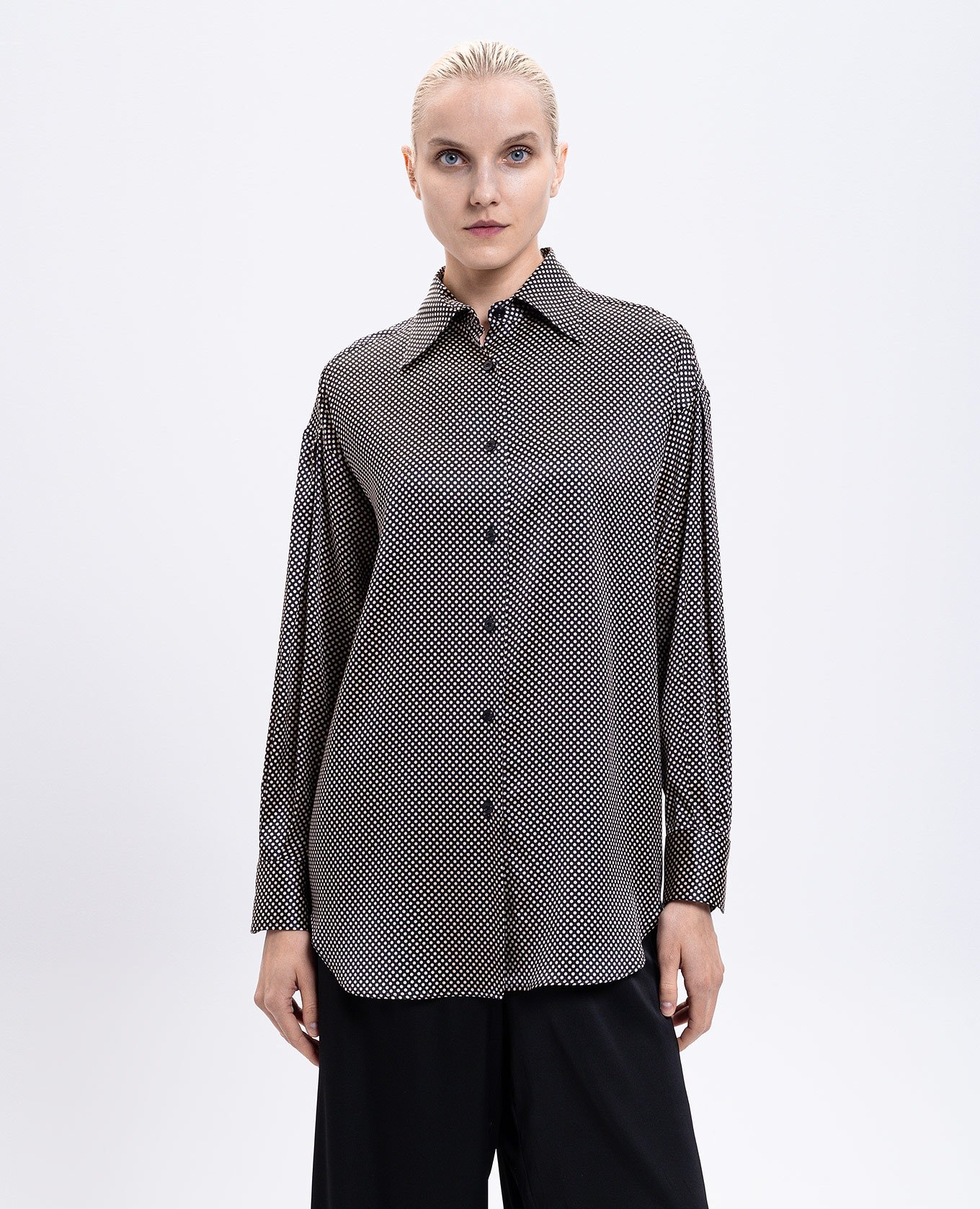 

Black elongated blouse made of polka dot silk Tom Ford