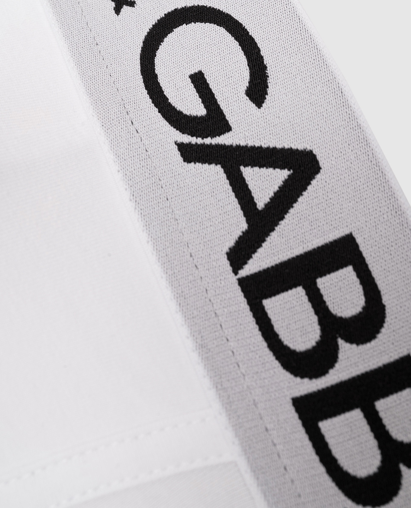 

A set of white boxer briefs with a logo pattern Dolce&Gabbana