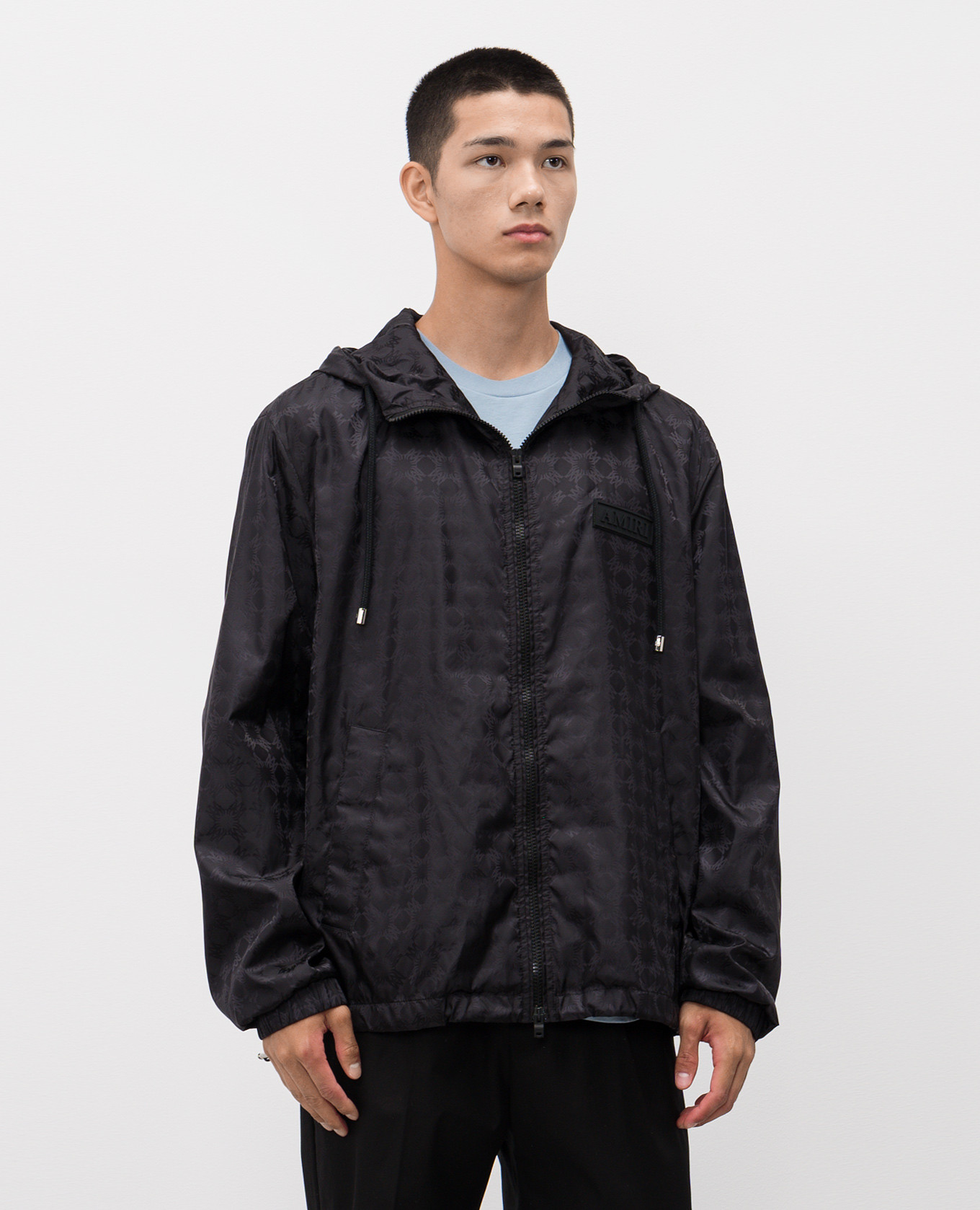 

Black windbreaker with monogram pattern AMIRI