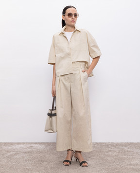 Brunello Cucinelli Beige pants with a textured pattern MQ994HH289