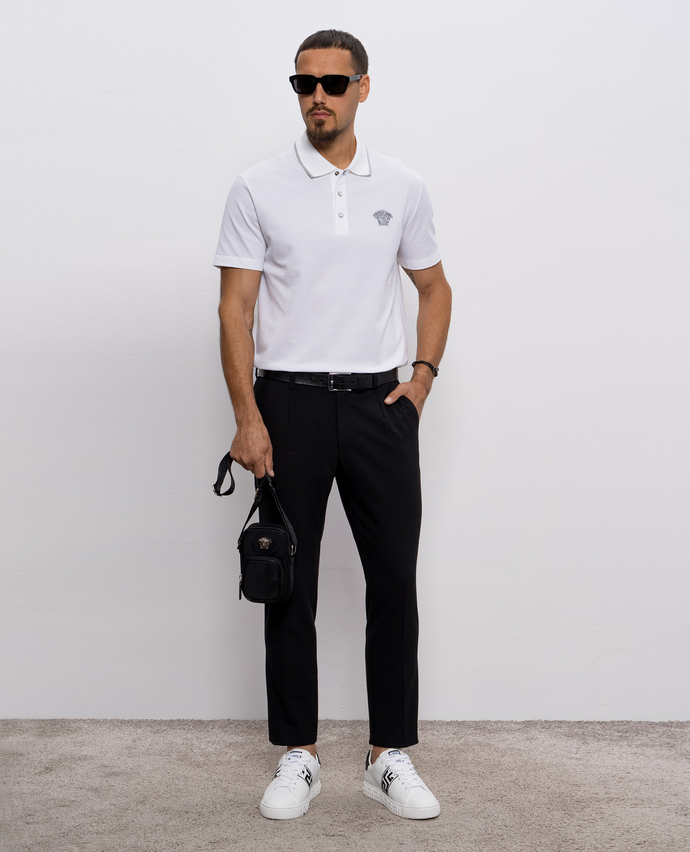 

White polo shirt with embroidered emblem Versace