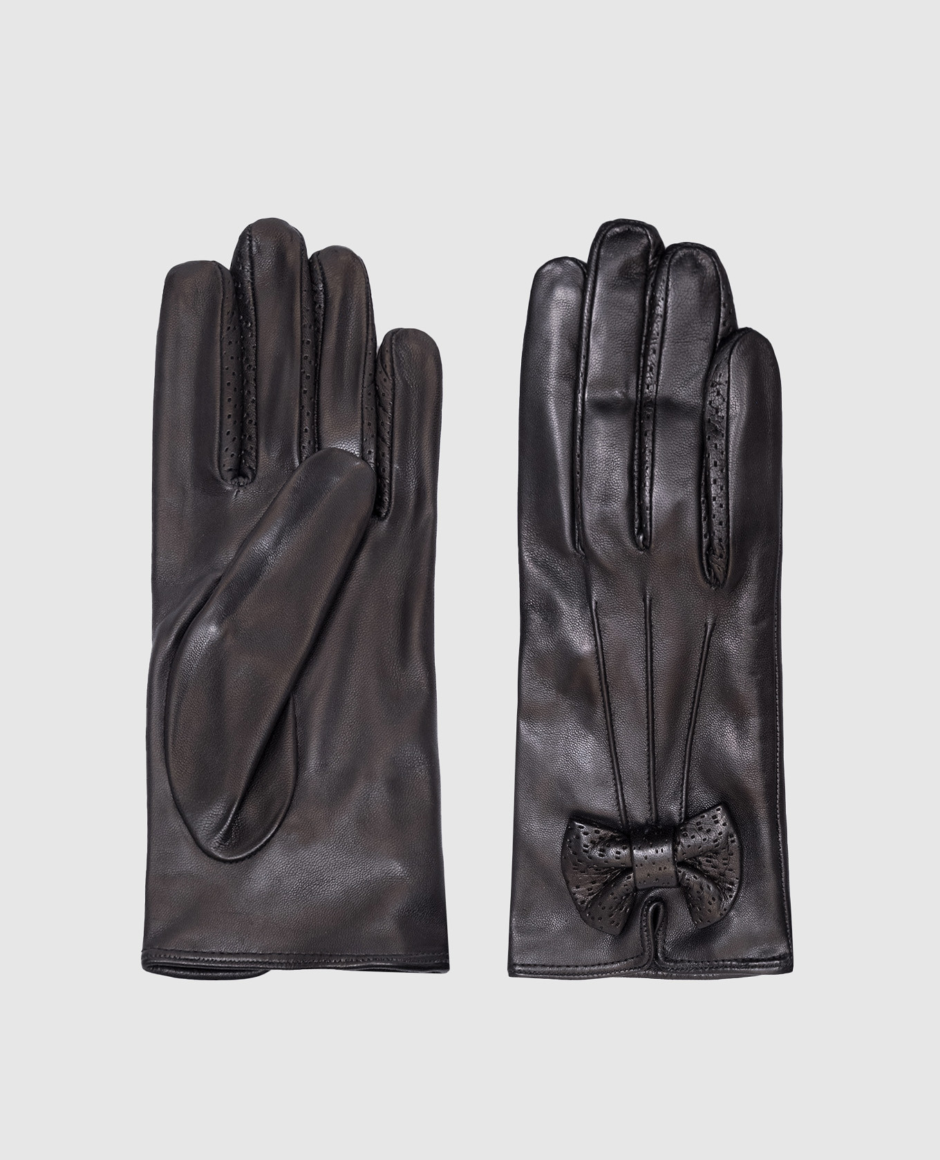

Black leather gloves with a bow Sermoneta Gloves