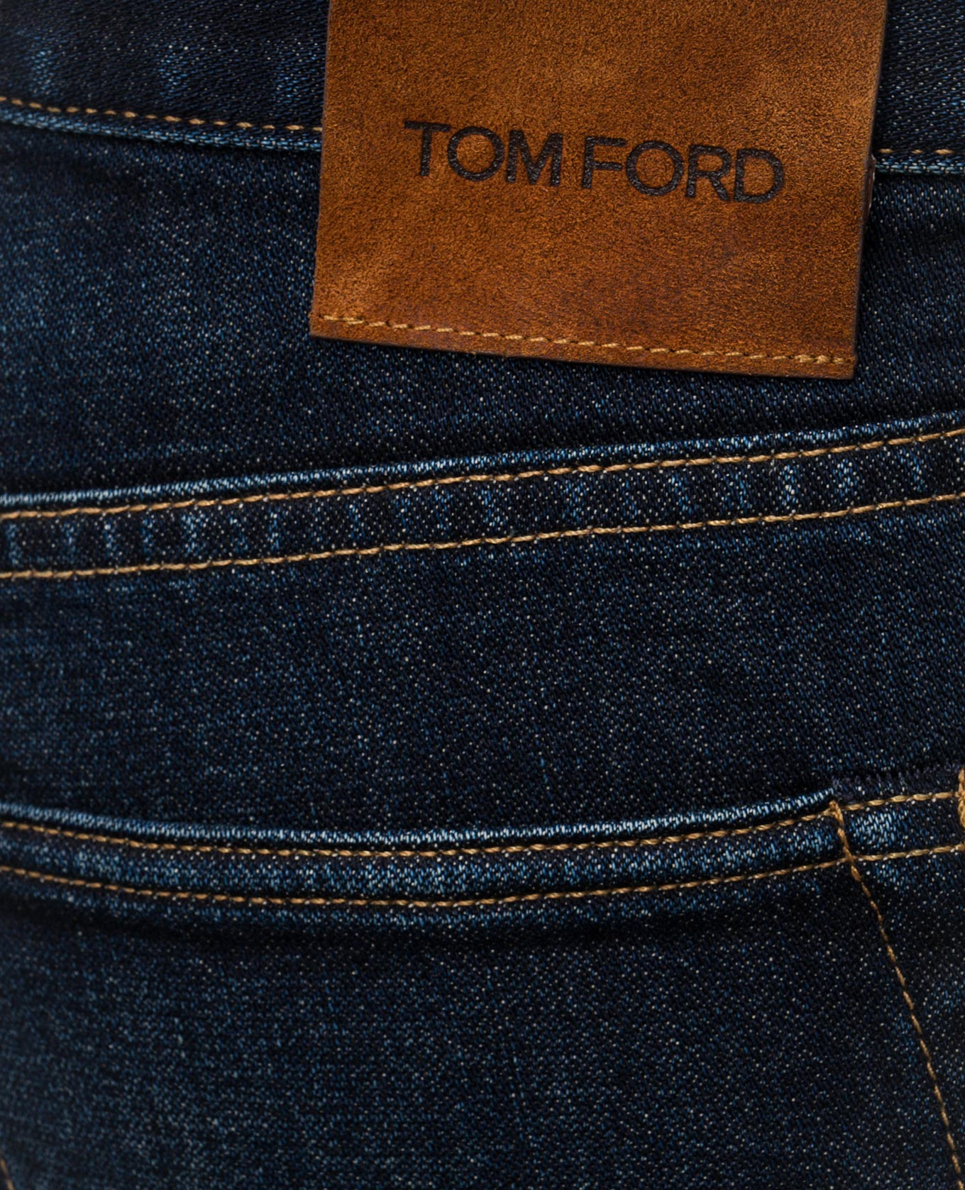 

Blue jeans with a worn effect Tom Ford