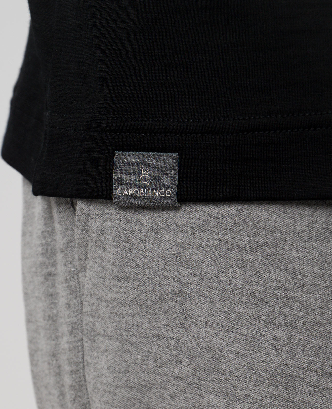 

Black wool longsleeve with logo CAPOBIANCO