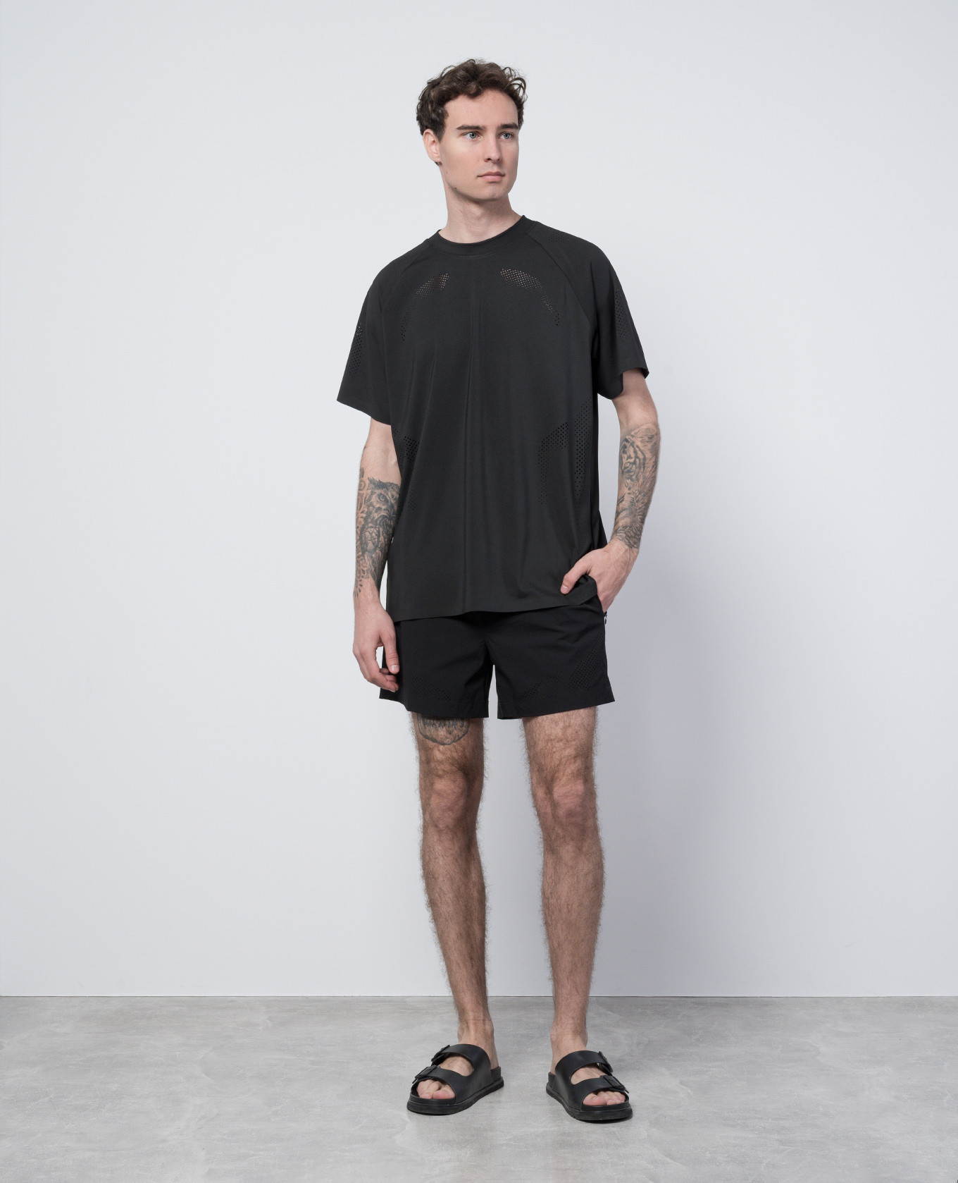 Intine black swim shorts with perforations Heliot Emil 2