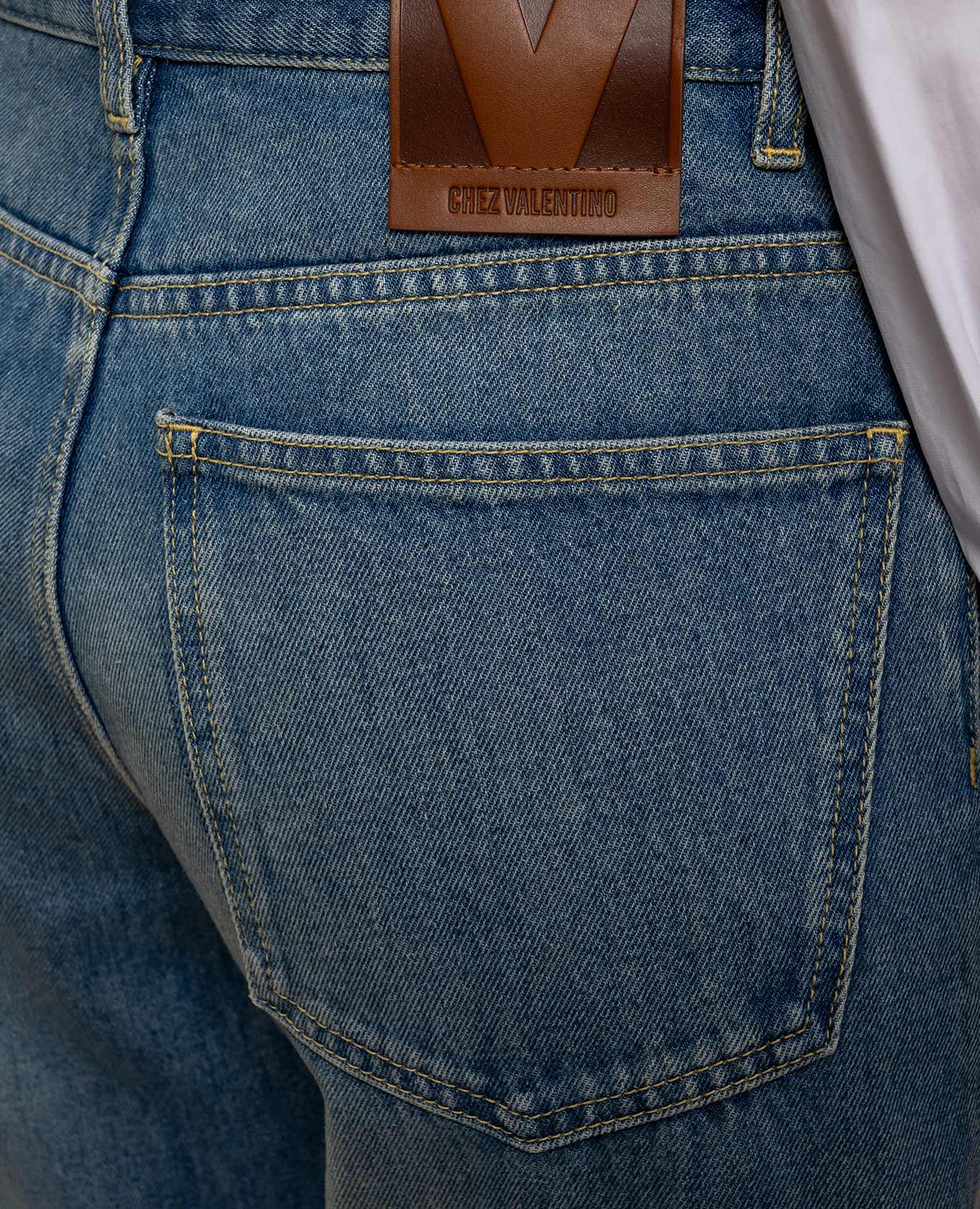 

Blue jeans with a worn effect Valentino